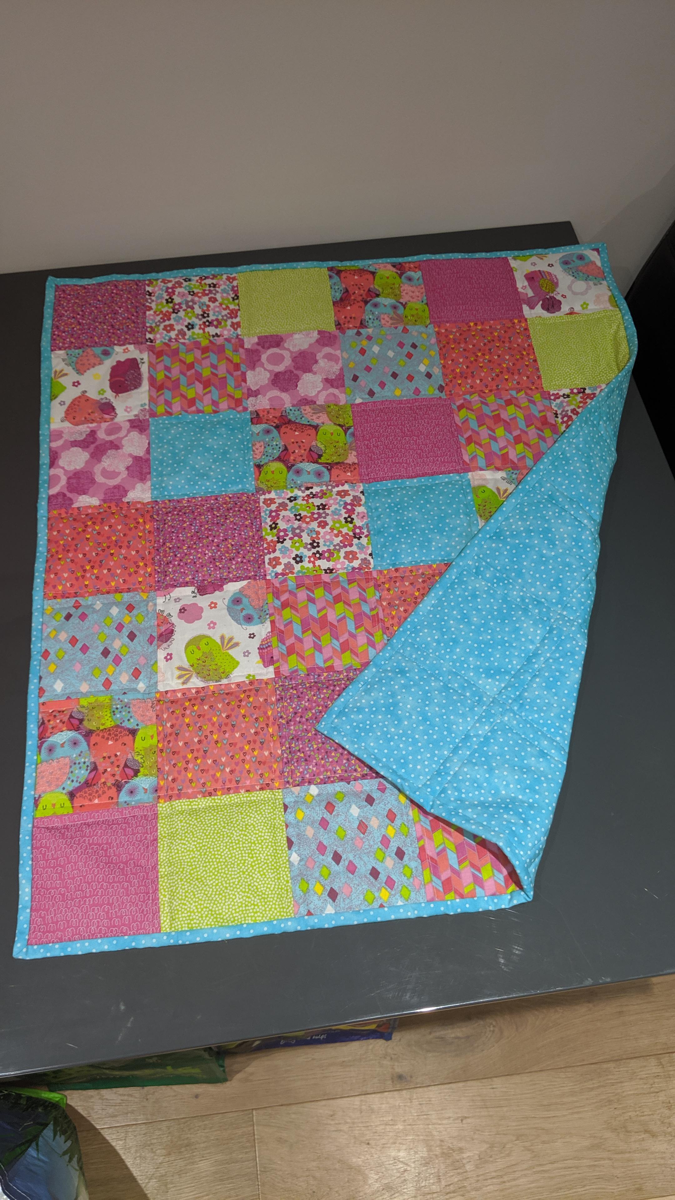 I just finished my first quilt! Giving it to my niece for her first