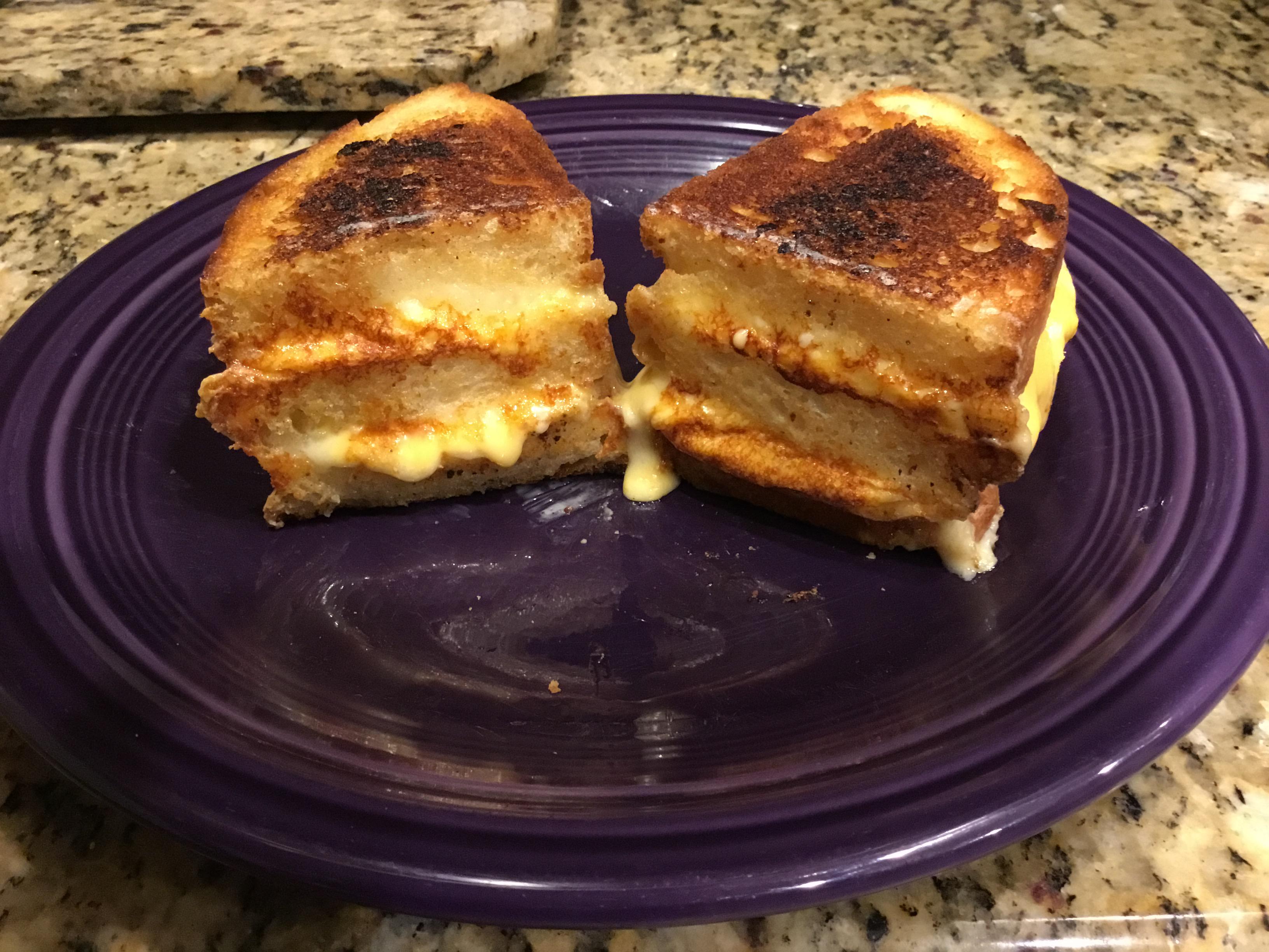 triple decker havarti and american grilled cheese with garlic seasoning on homemade sourdough