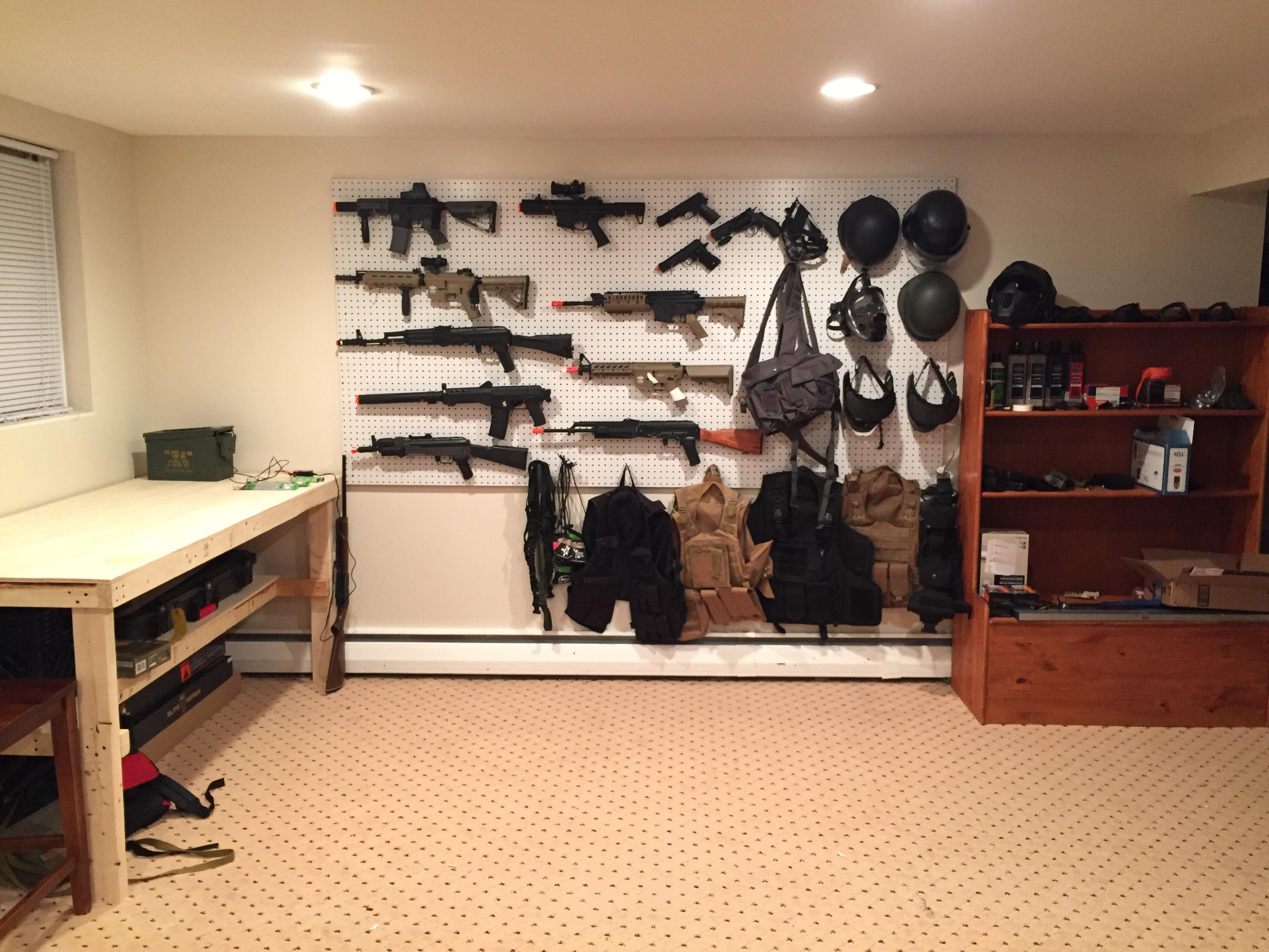 Built a gun rack and workbench to display my beauties r/airsoft