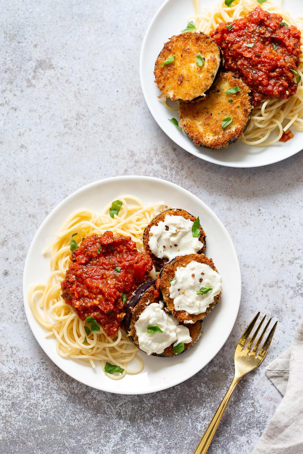 Vegan Eggplant Parmesan with Cashew Mozzarella recipe link in comments r/veganrecipes