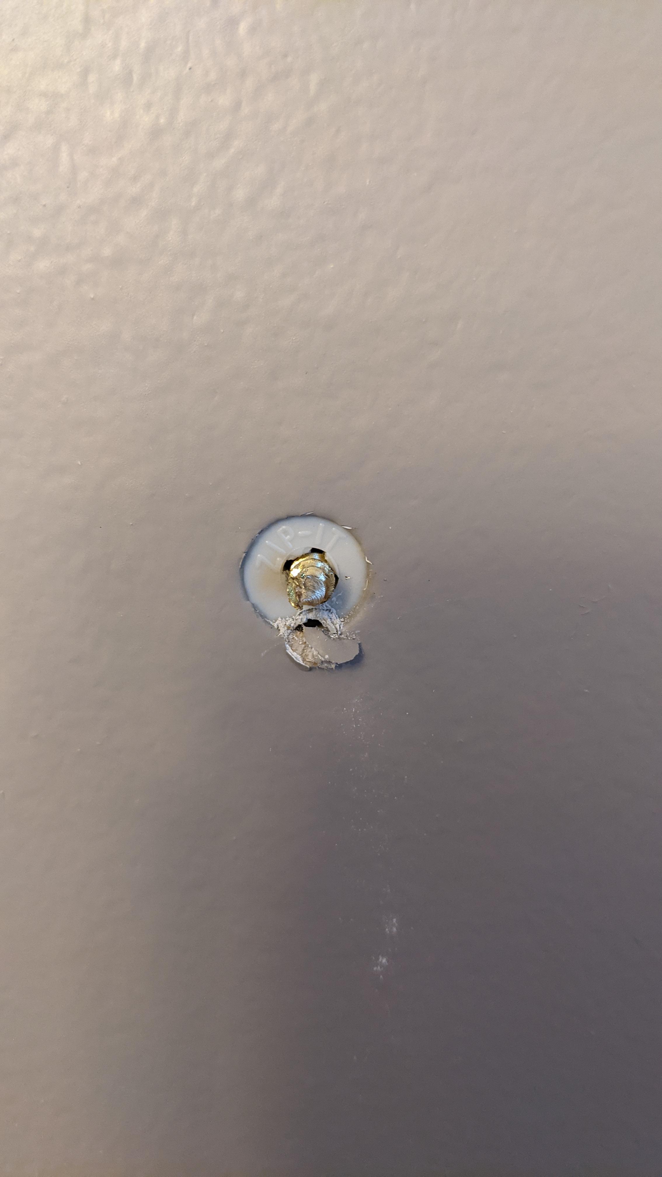 How do I get this wall anchor out with a broken off screw in it? r/fixit