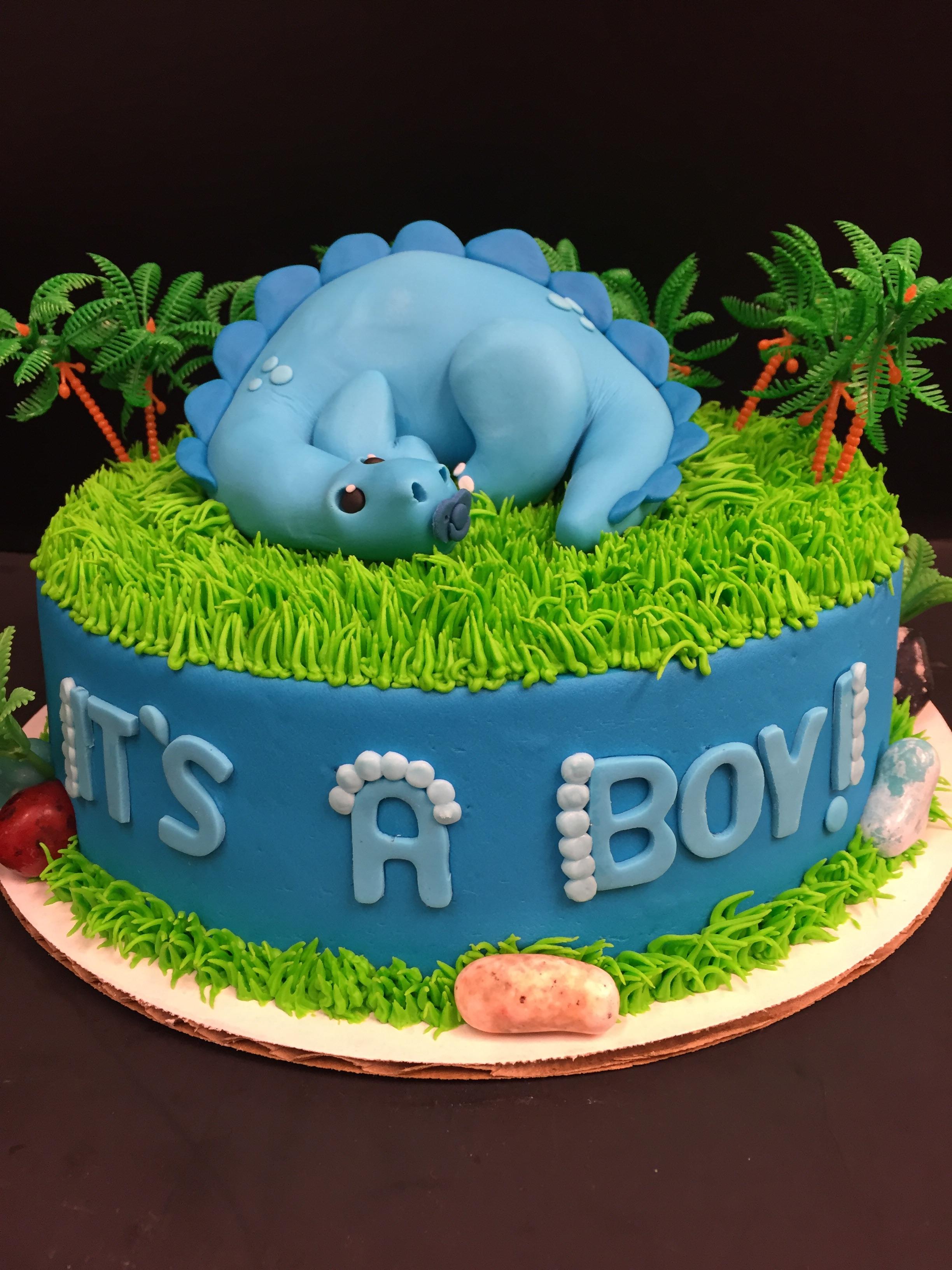 Baby dinosaur for baby shower! Chocolate cake with raspberry filing r/Baking