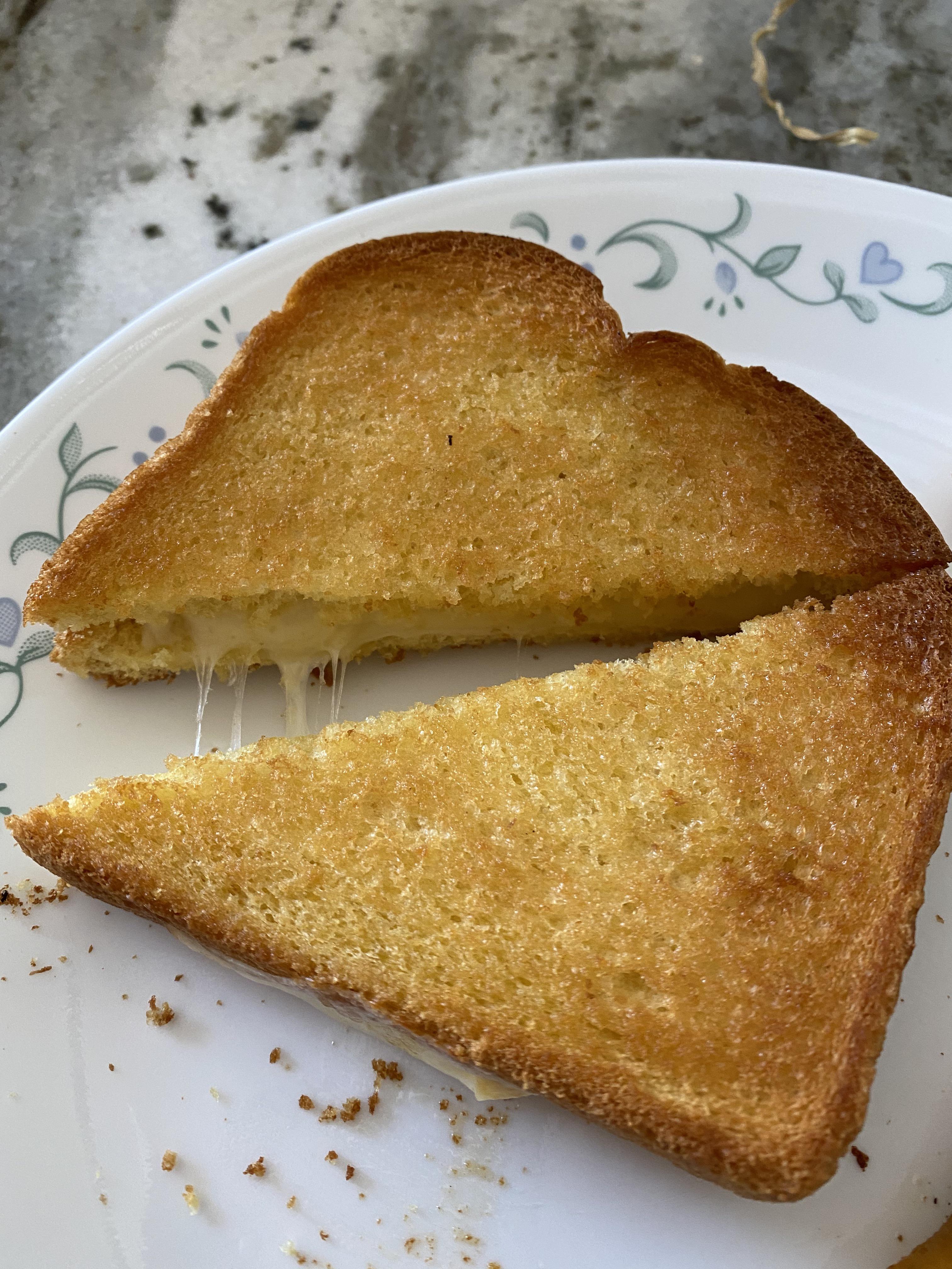 My best toaster oven grilled cheese yet. Heavily buttered potato bread