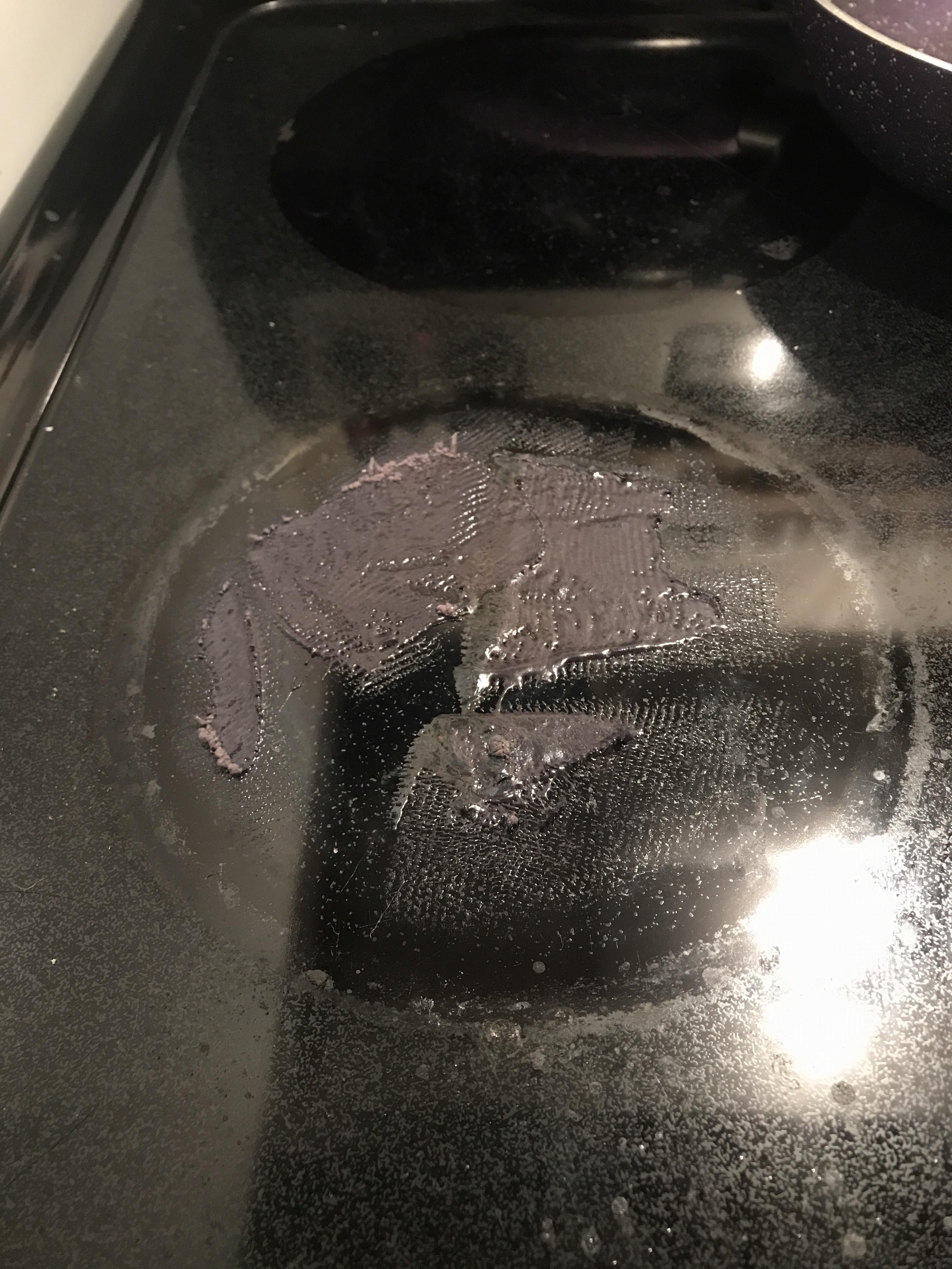 Was dumb and sat a 100 polyester on a hot stove. Any idea how to clean