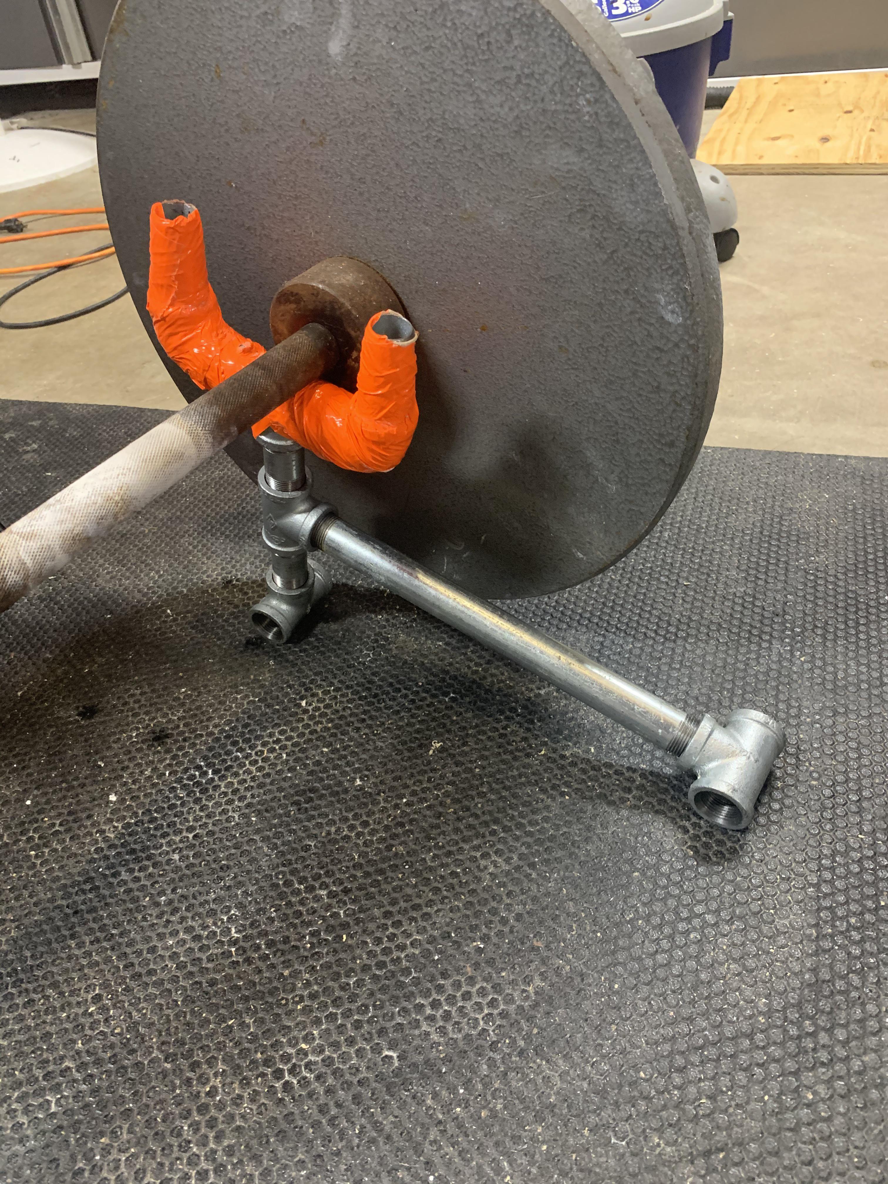 DIY mini deadlift jack. 3/4” galvanized pipe, wrapped with duct tape so