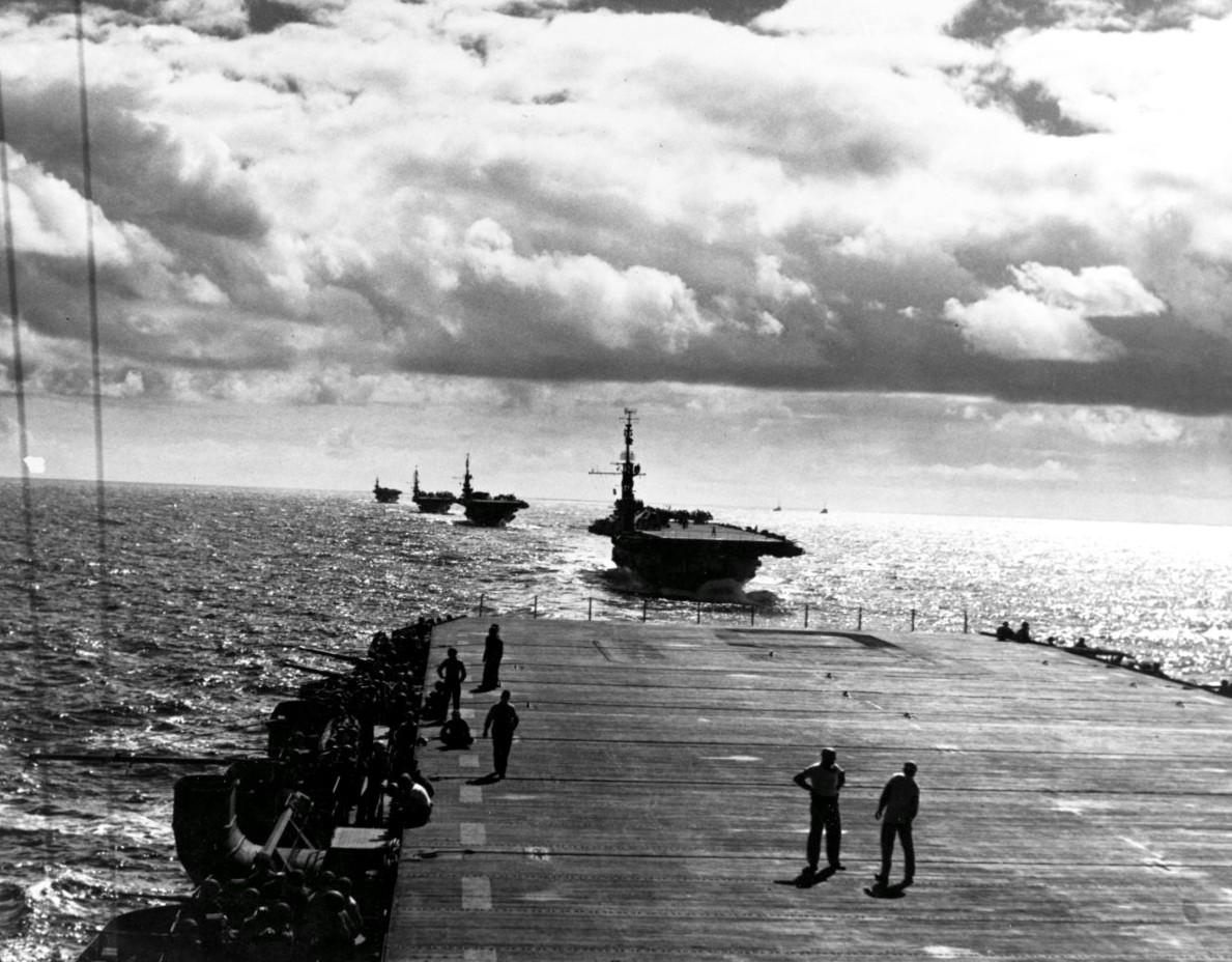Escort carriers practicing division formation and maneuver exercises