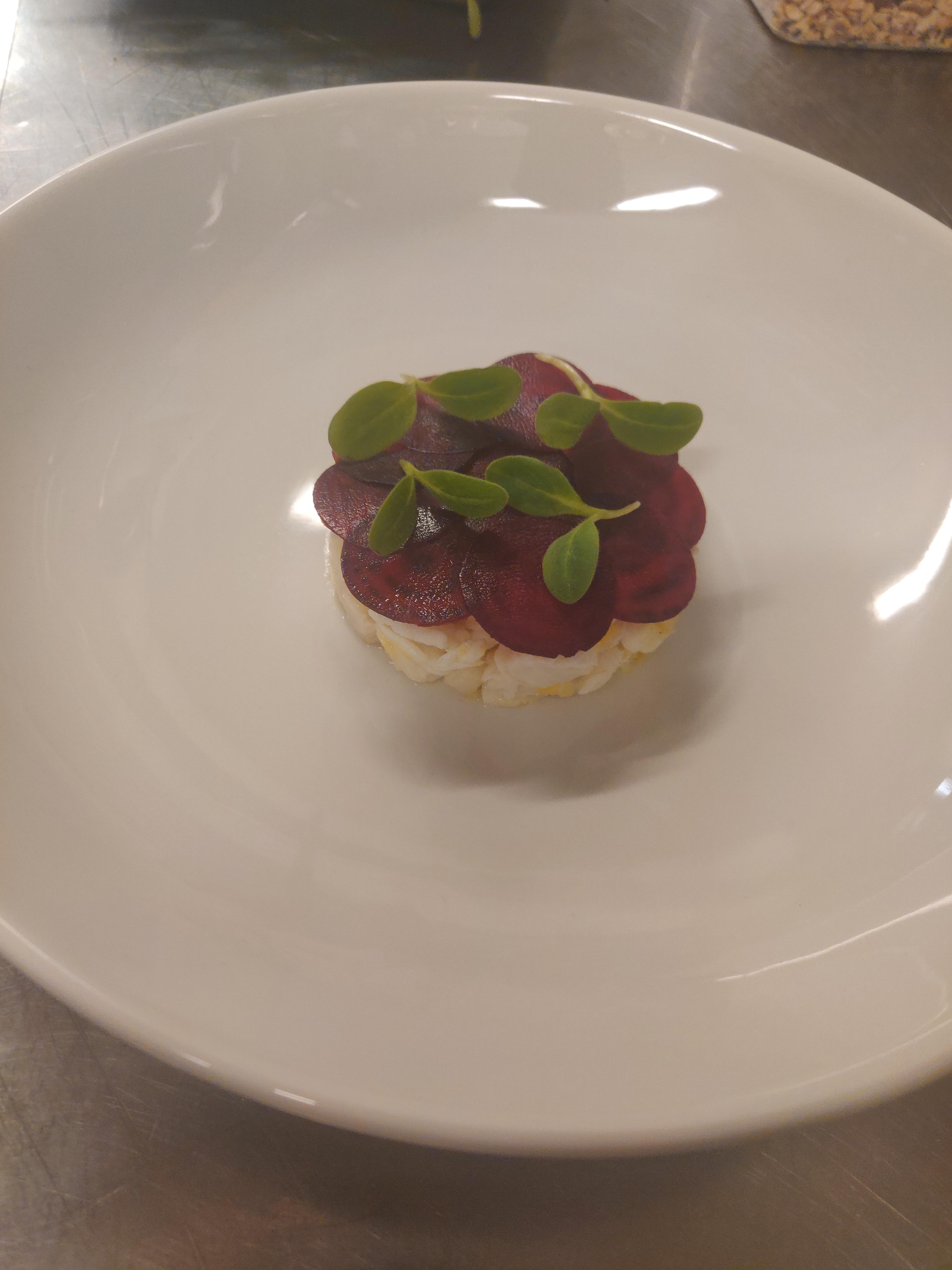 Haddock ceviche with an artichoke puree, roasted hazelnuts, a roof made