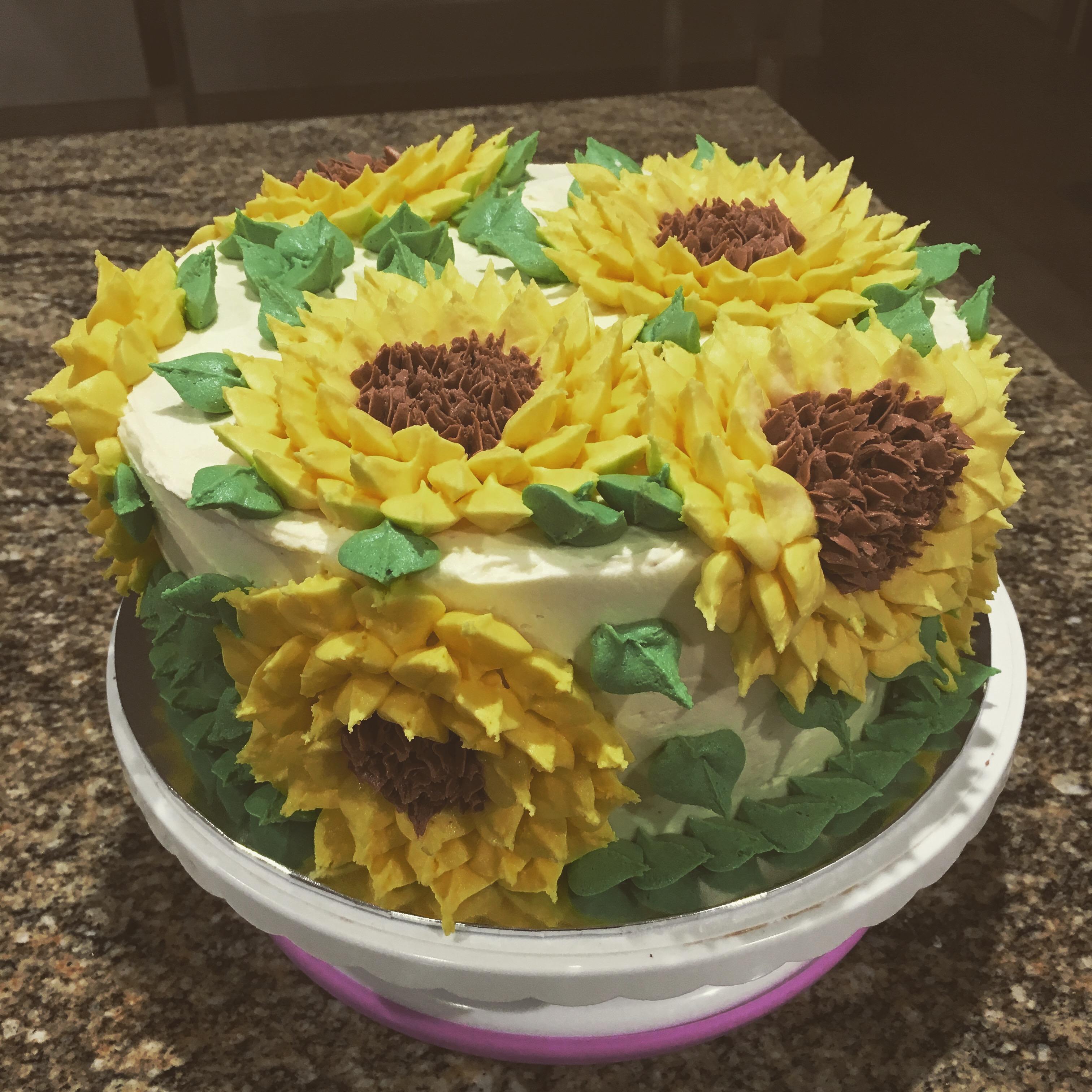 Sunflower Cake with vanilla buttercream. Wanted to try out my new leaf