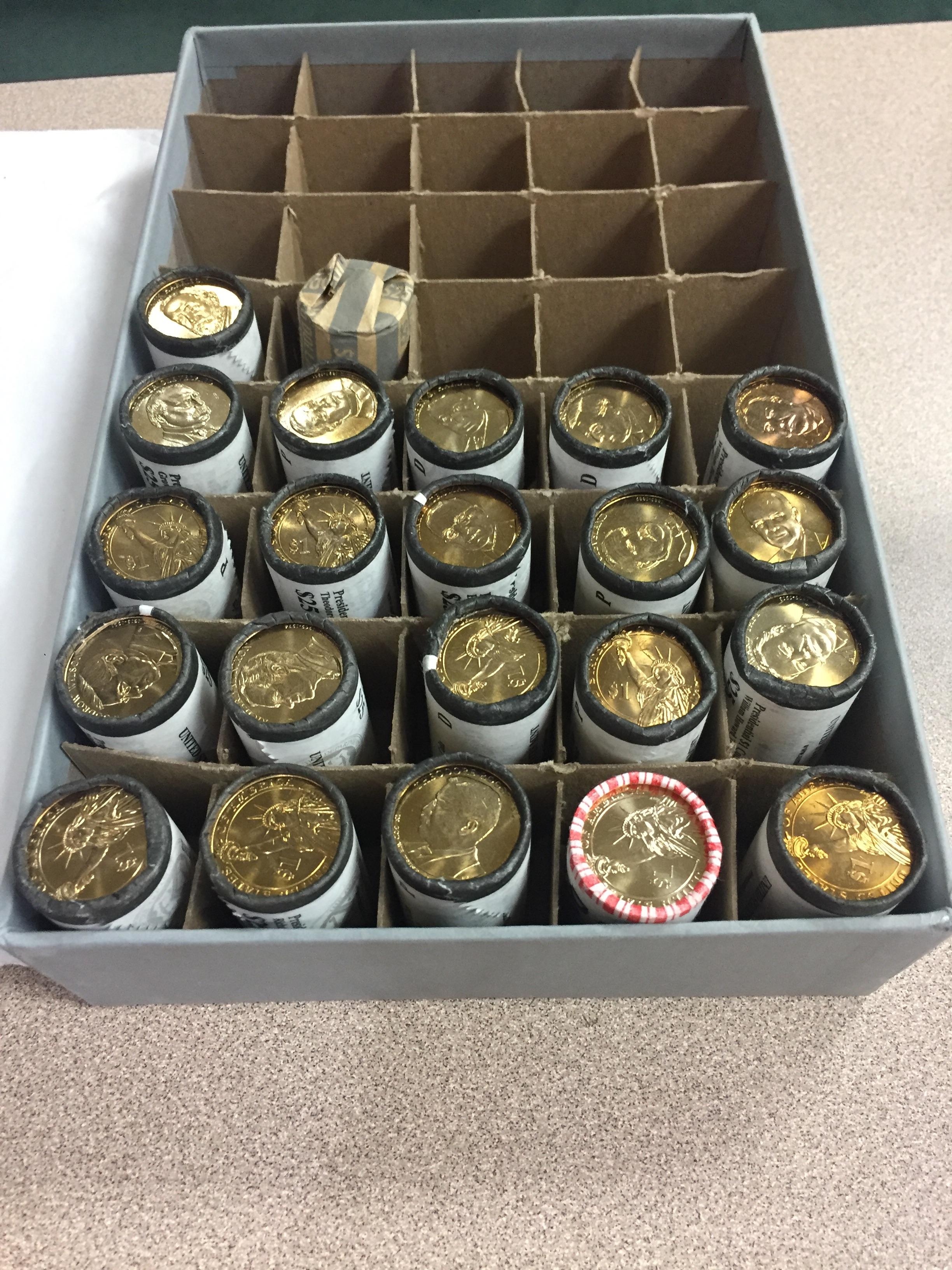 U.S. Mint rolls Presidential Dollar hoard that I acquired from a local