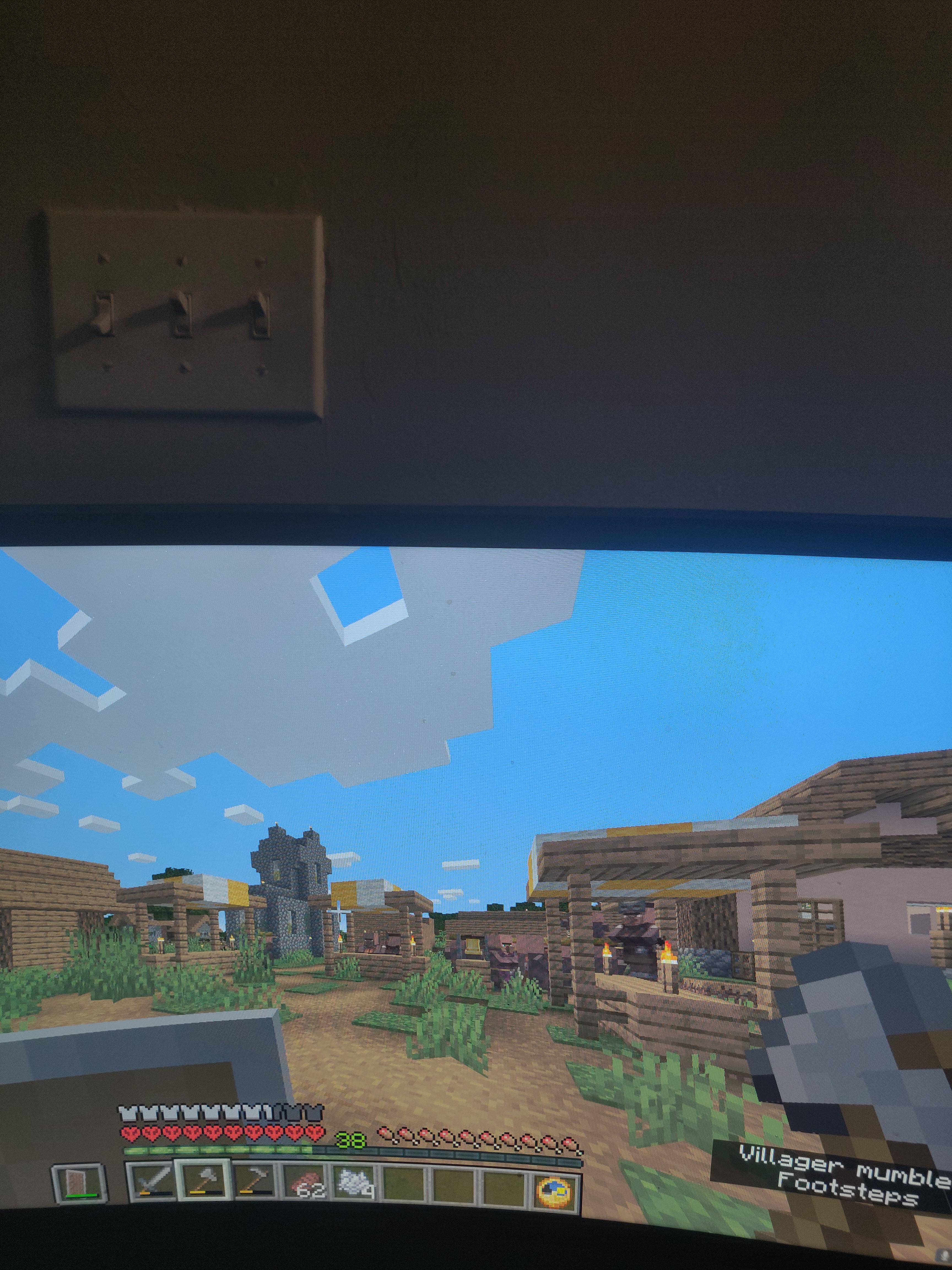 Why do villagers gather around the wool and wooden structures. r