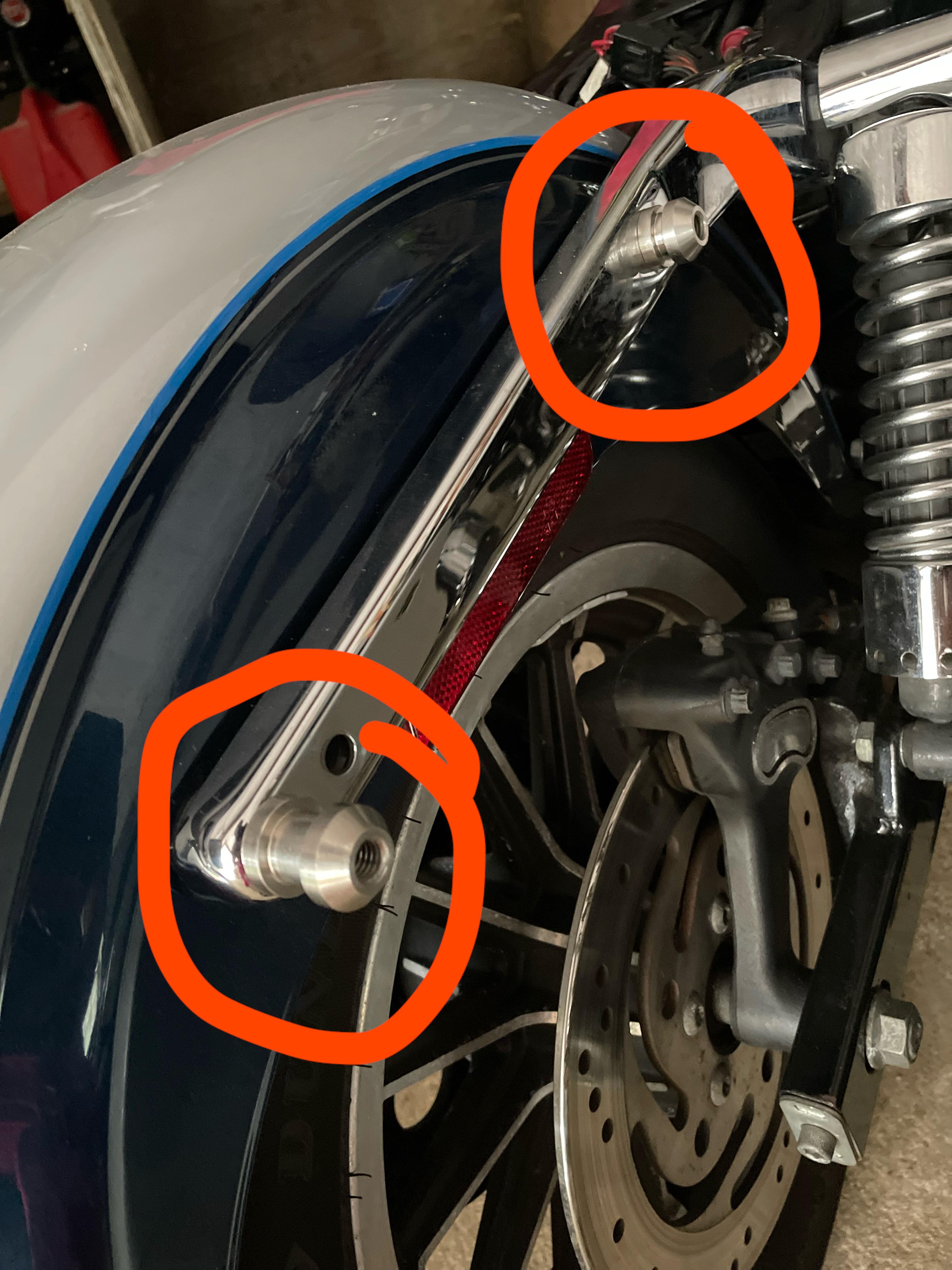 Does anyone know how to take these off to get the fender off my dyna