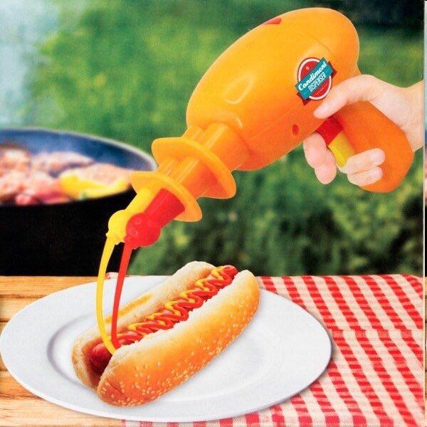 A plastic gun that squirts ketchup and mustard whoneededthis