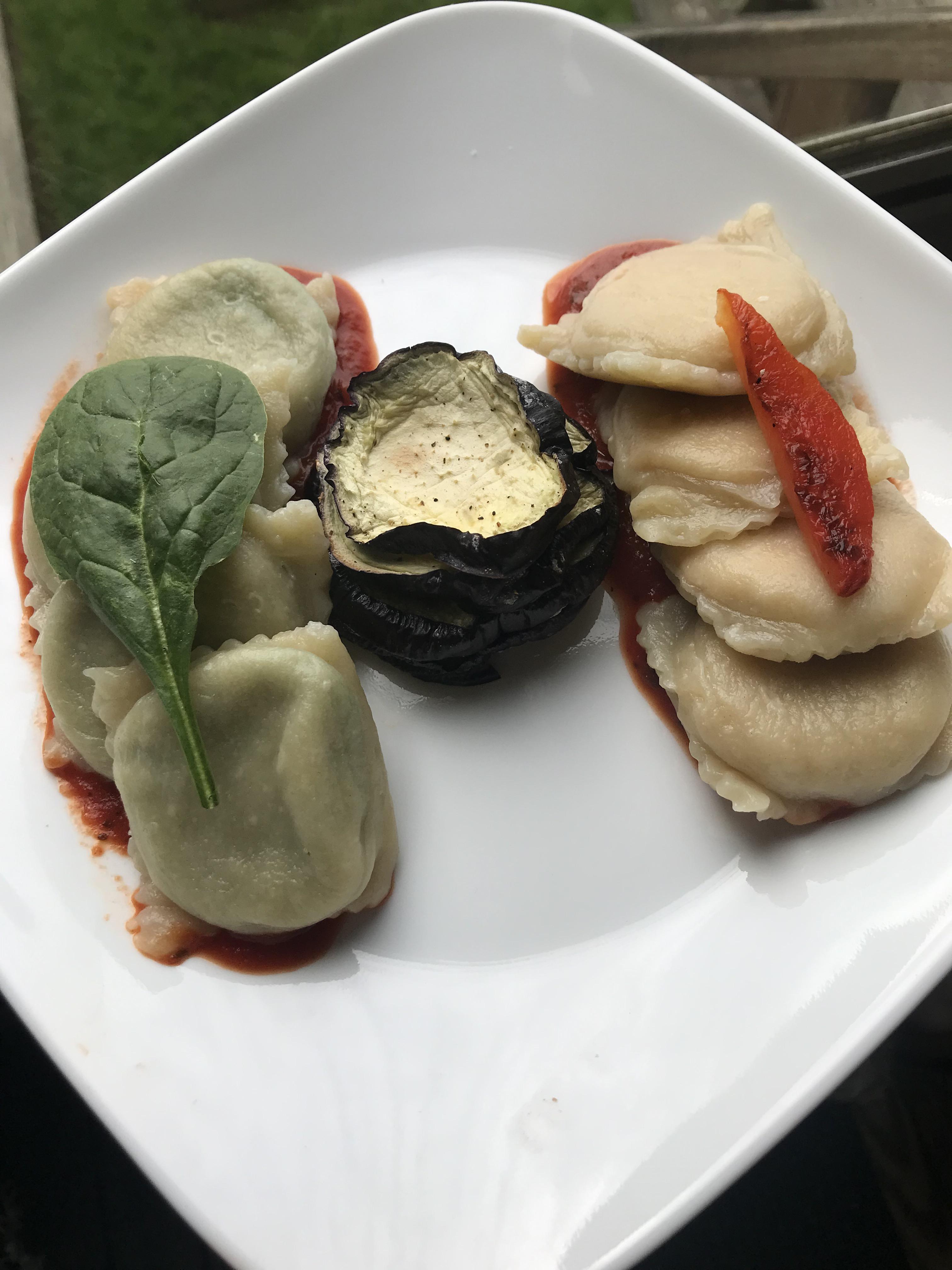 Spinach tofu ricotta and roasted red pepper tofu ricotta ravioli with marinara and roasted