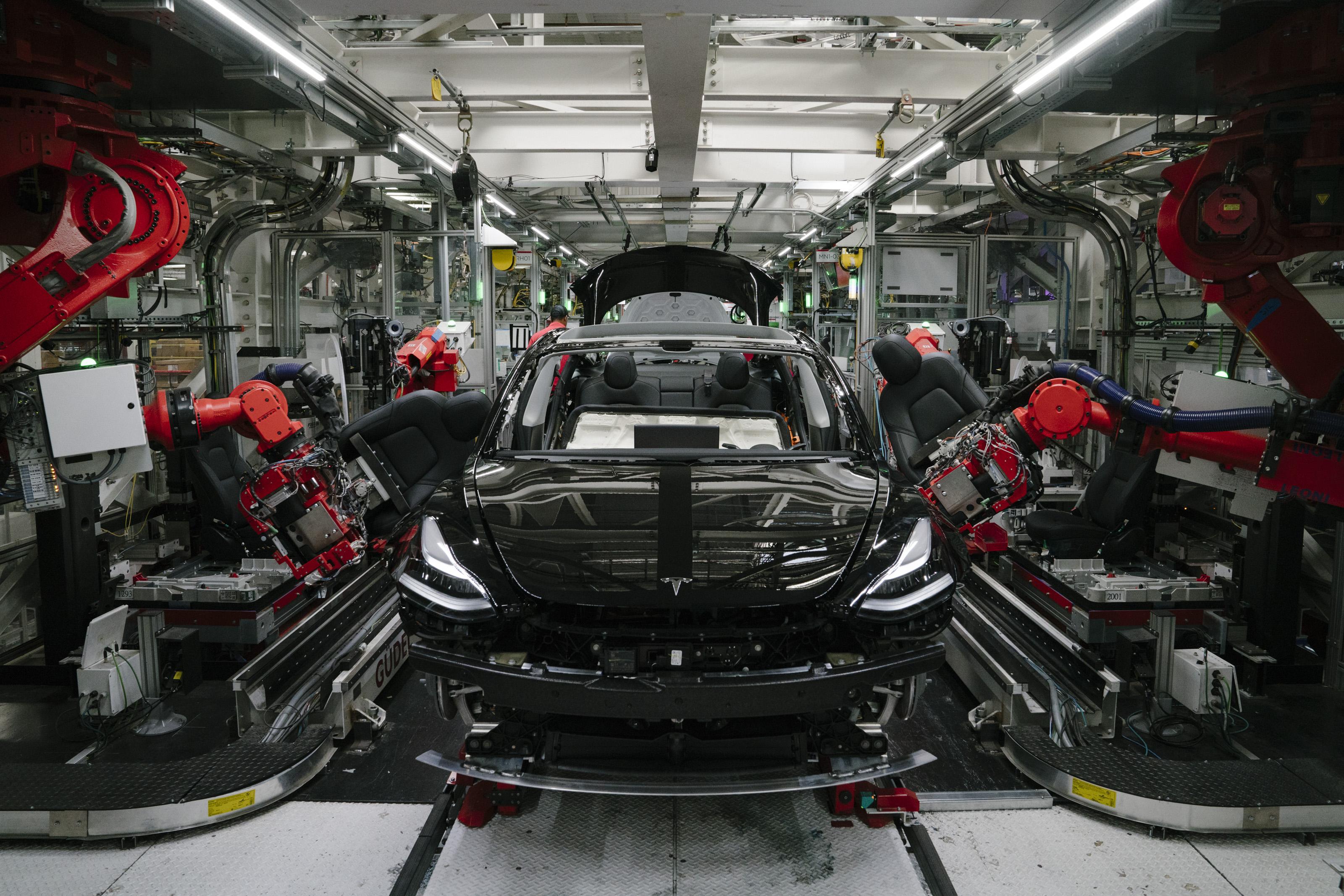 A Tesla Model 3 is seen in the general assembly line at the Tesla