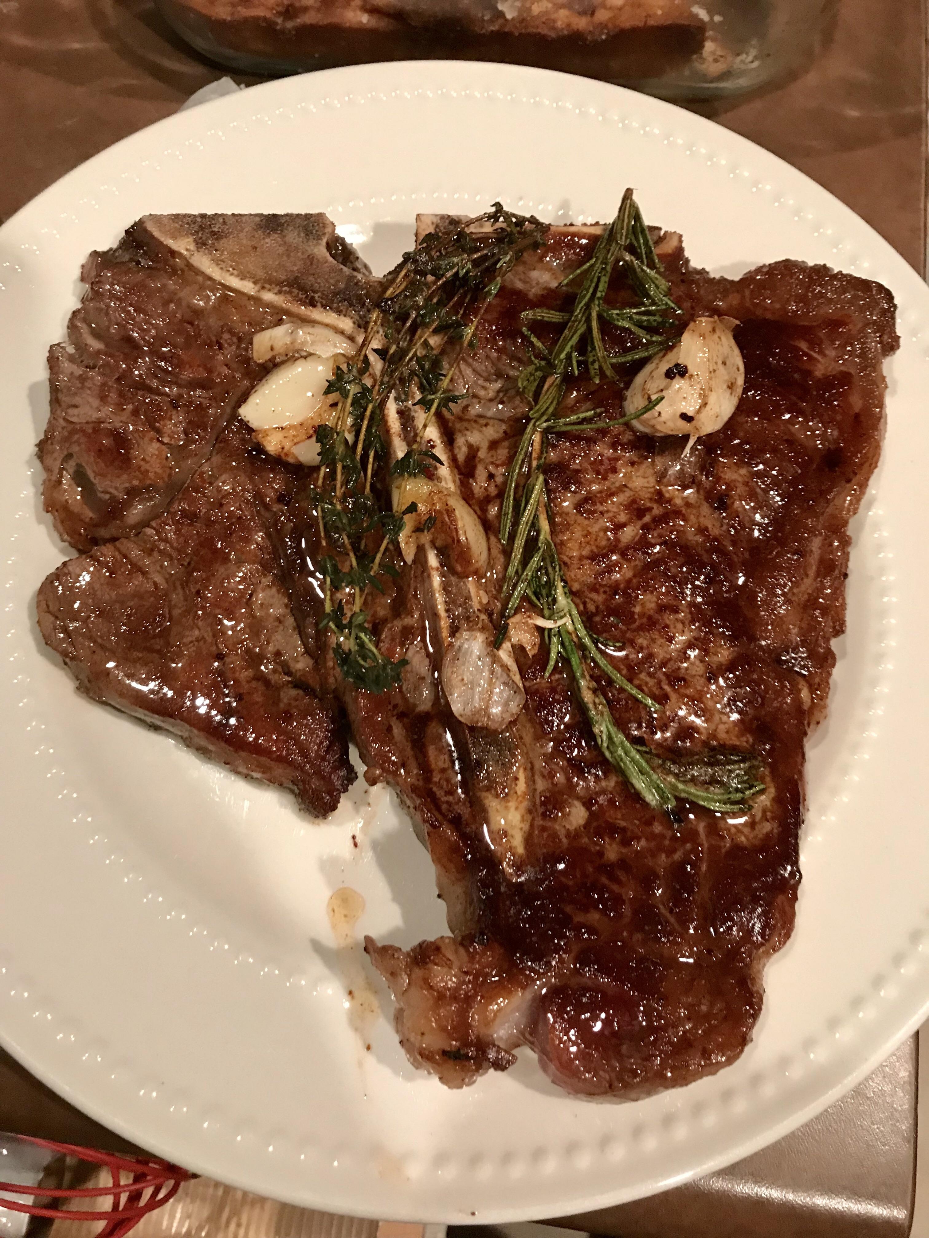 [homemade] T Bone steak basted with butter, rosemary, thyme and fresh