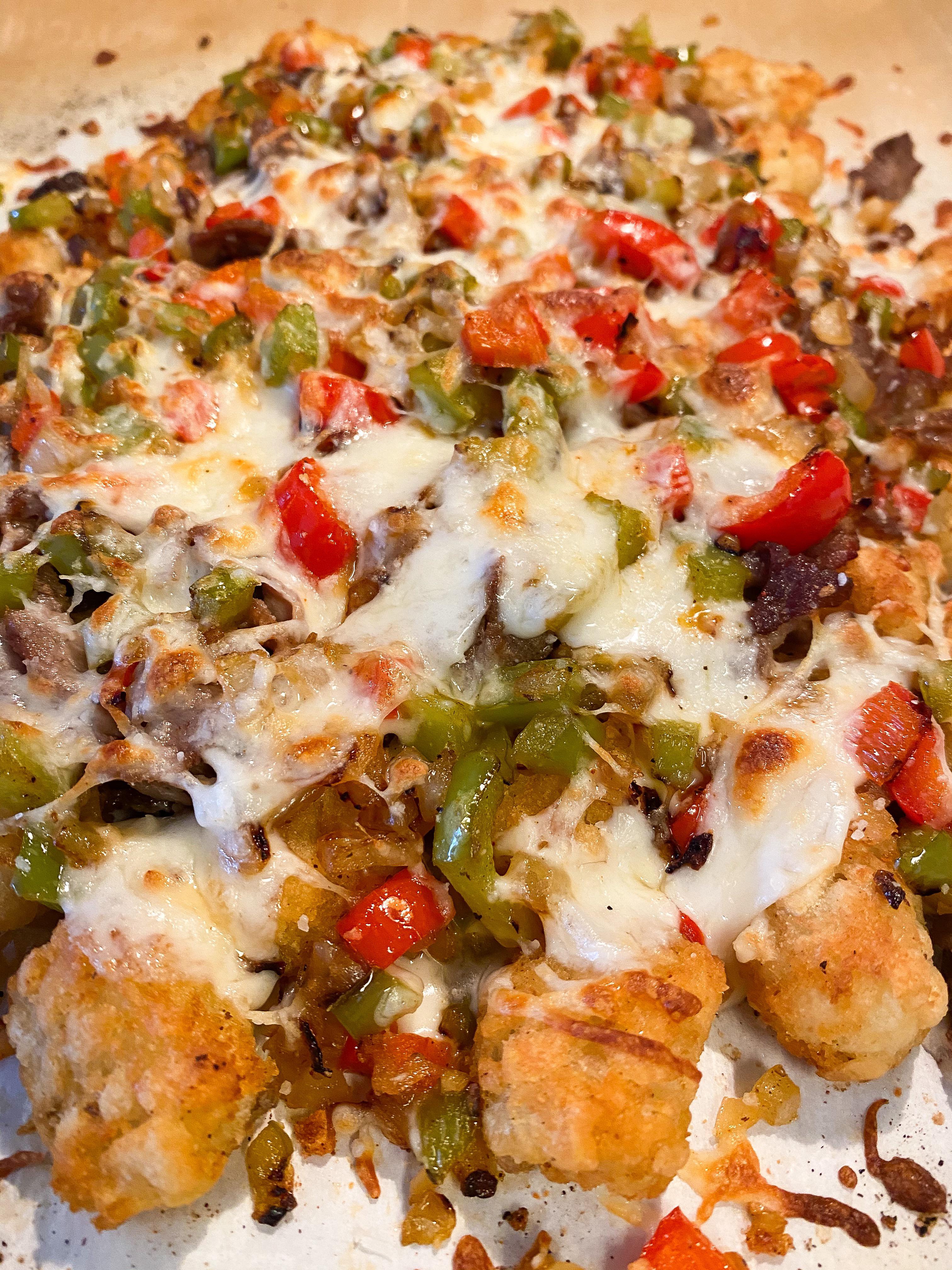 Tonight’s dinner was Philly cheesesteak tater tots. Lots of steak