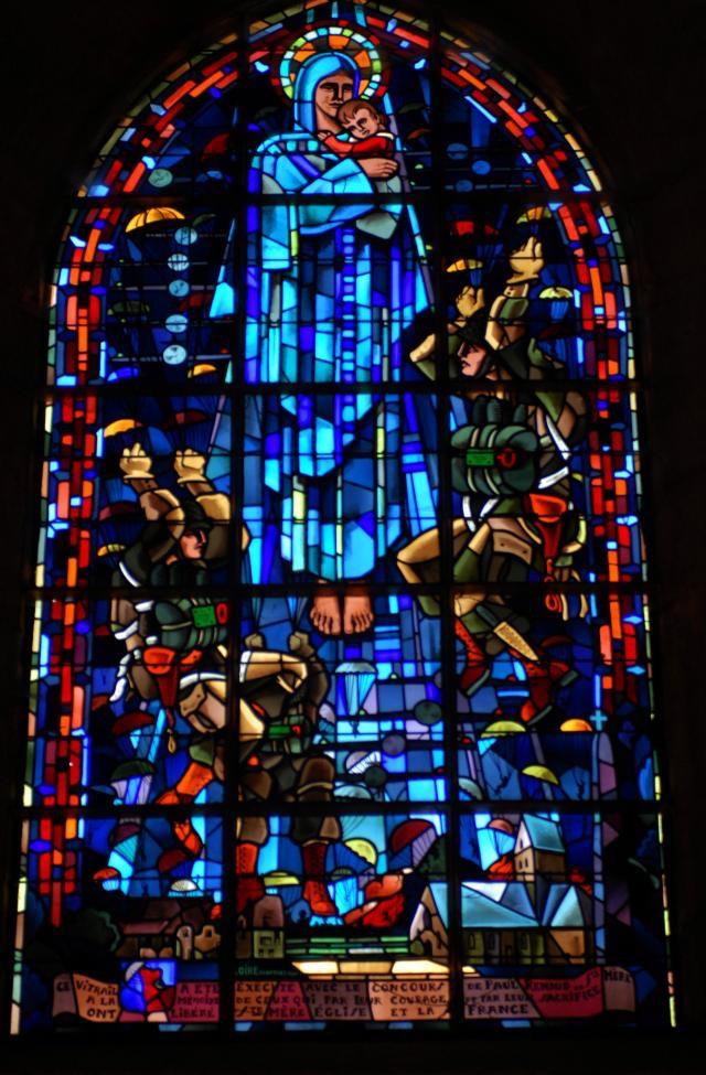 This stained glass window at the St. MereEglise church. r/interestingasfuck