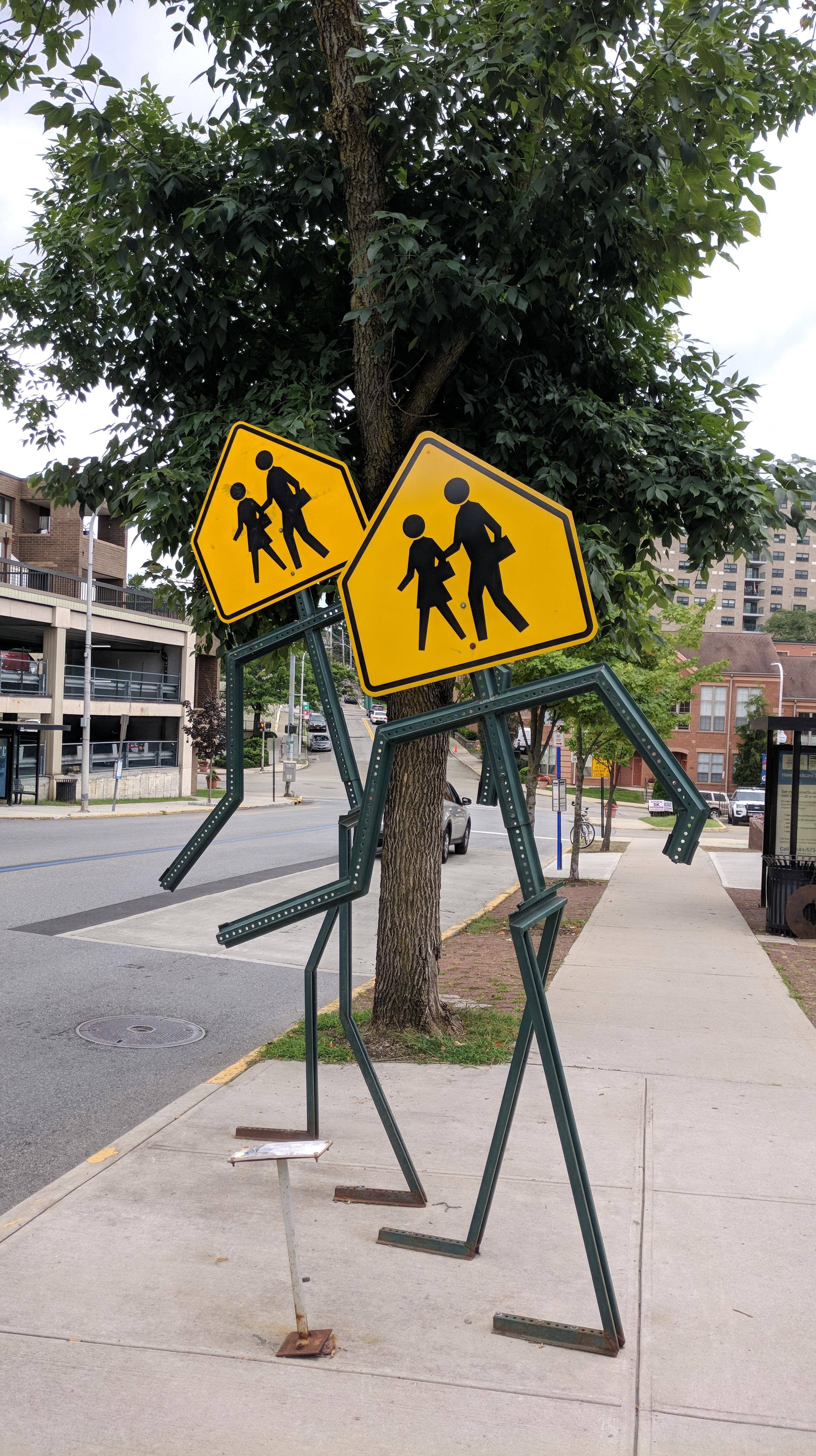 these school crosswalk signs are shaped like stick figures r/mildlyinteresting