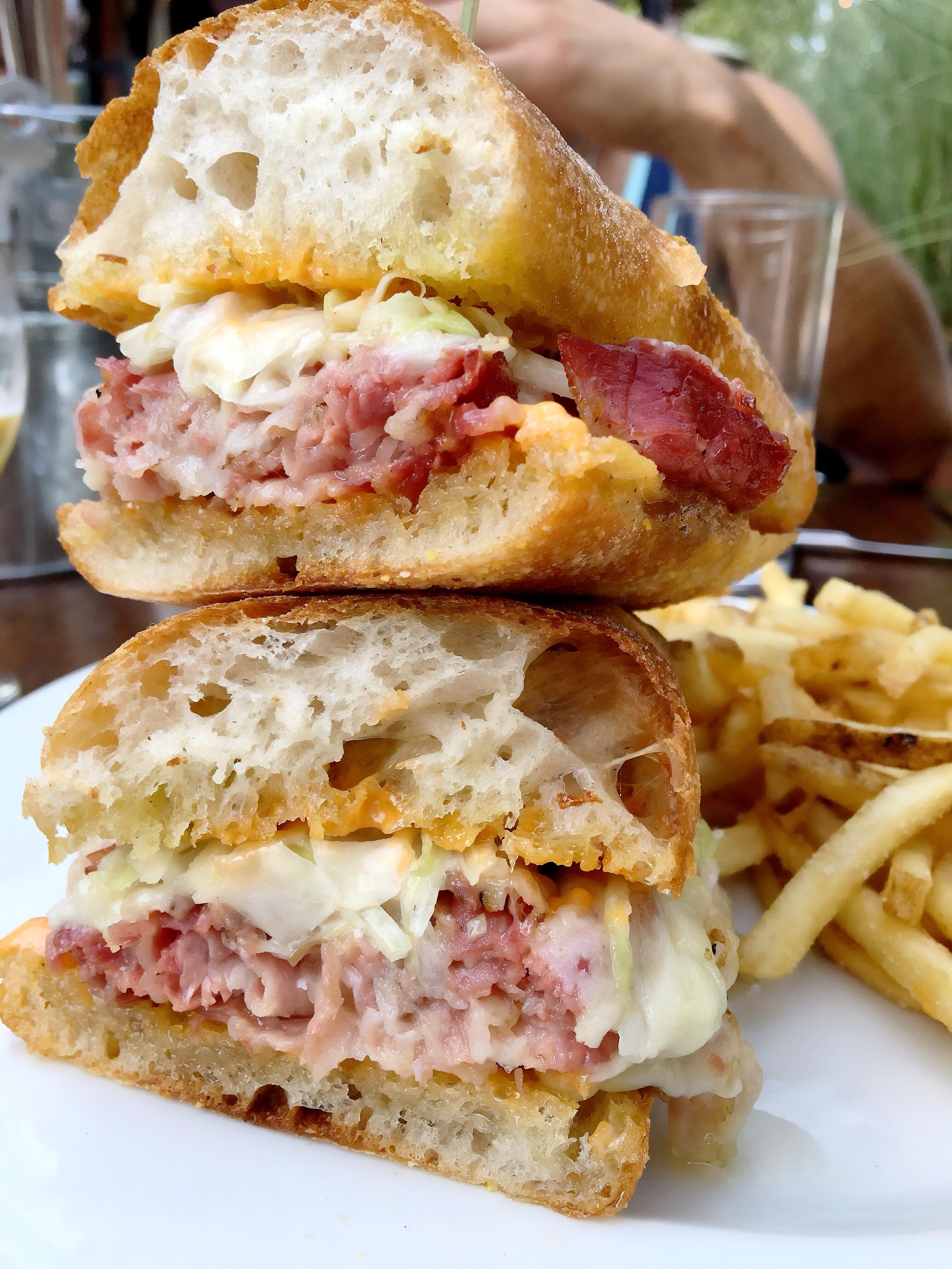 [I ate] a pastrami sandwich with spicy mayo, cherry peppers, melted