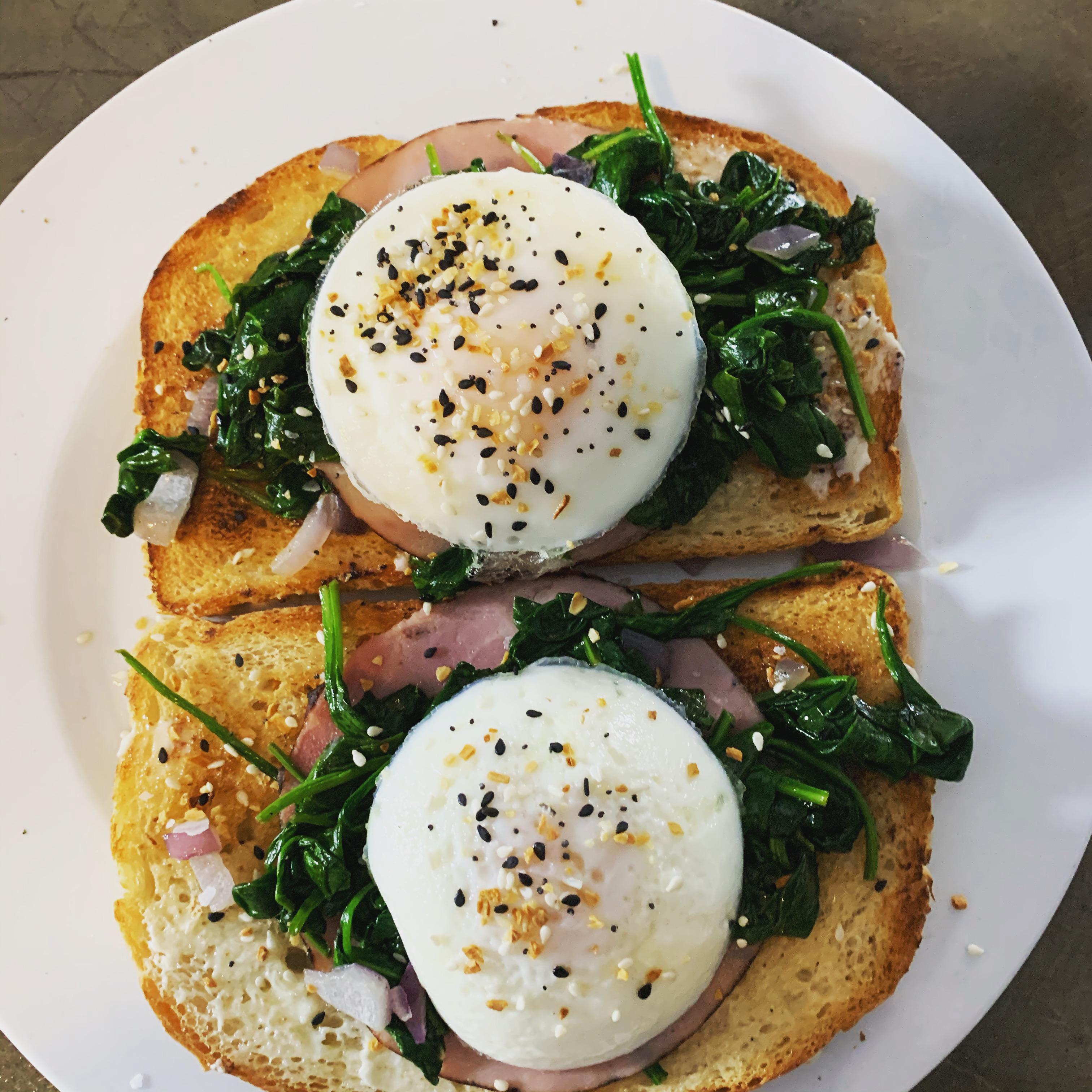 Poached eggs, spinach and ham on sourdough with everything but the