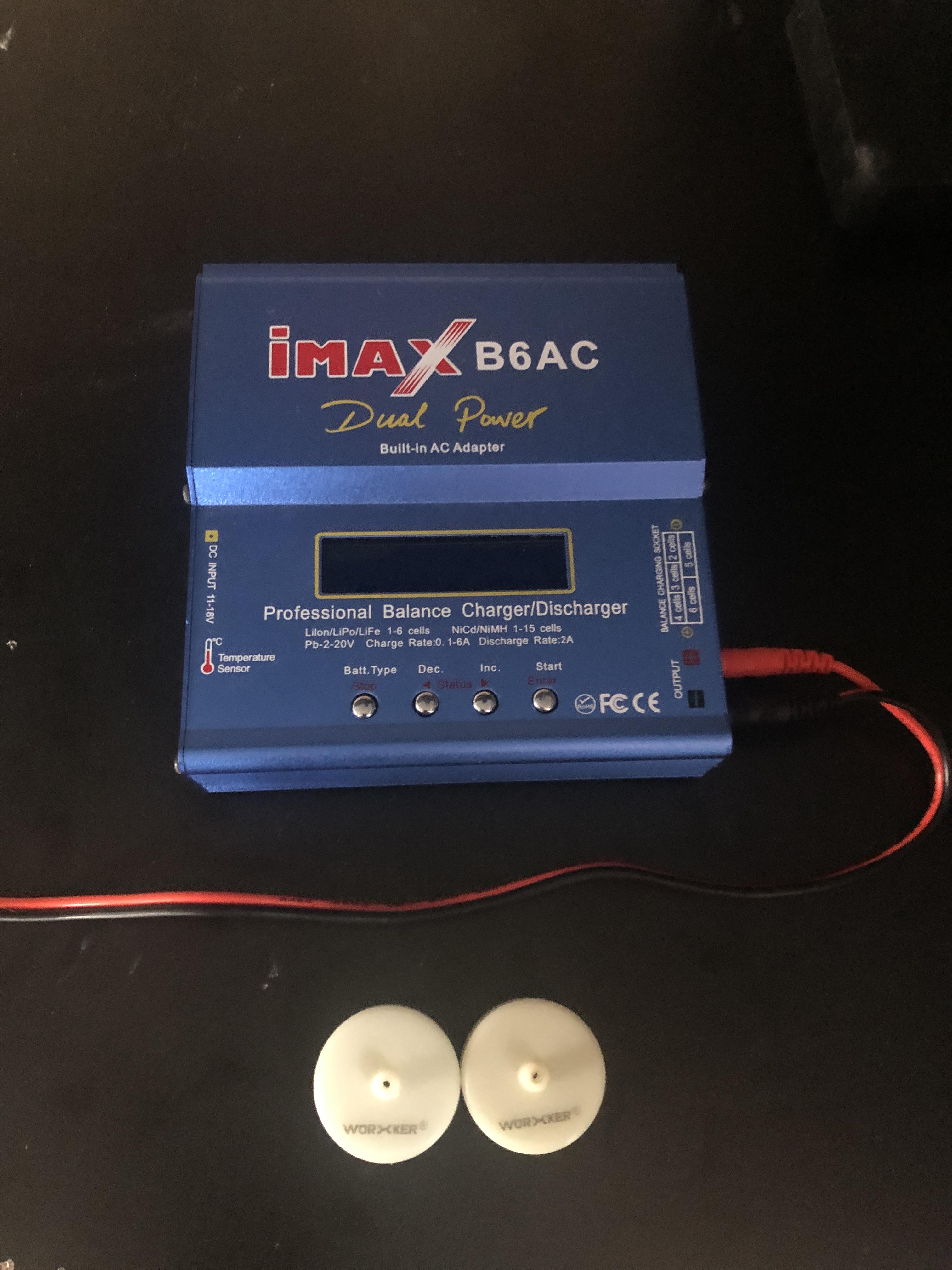 WTS iMAX B6AC Dual Power lipo charger and a pair of white worker