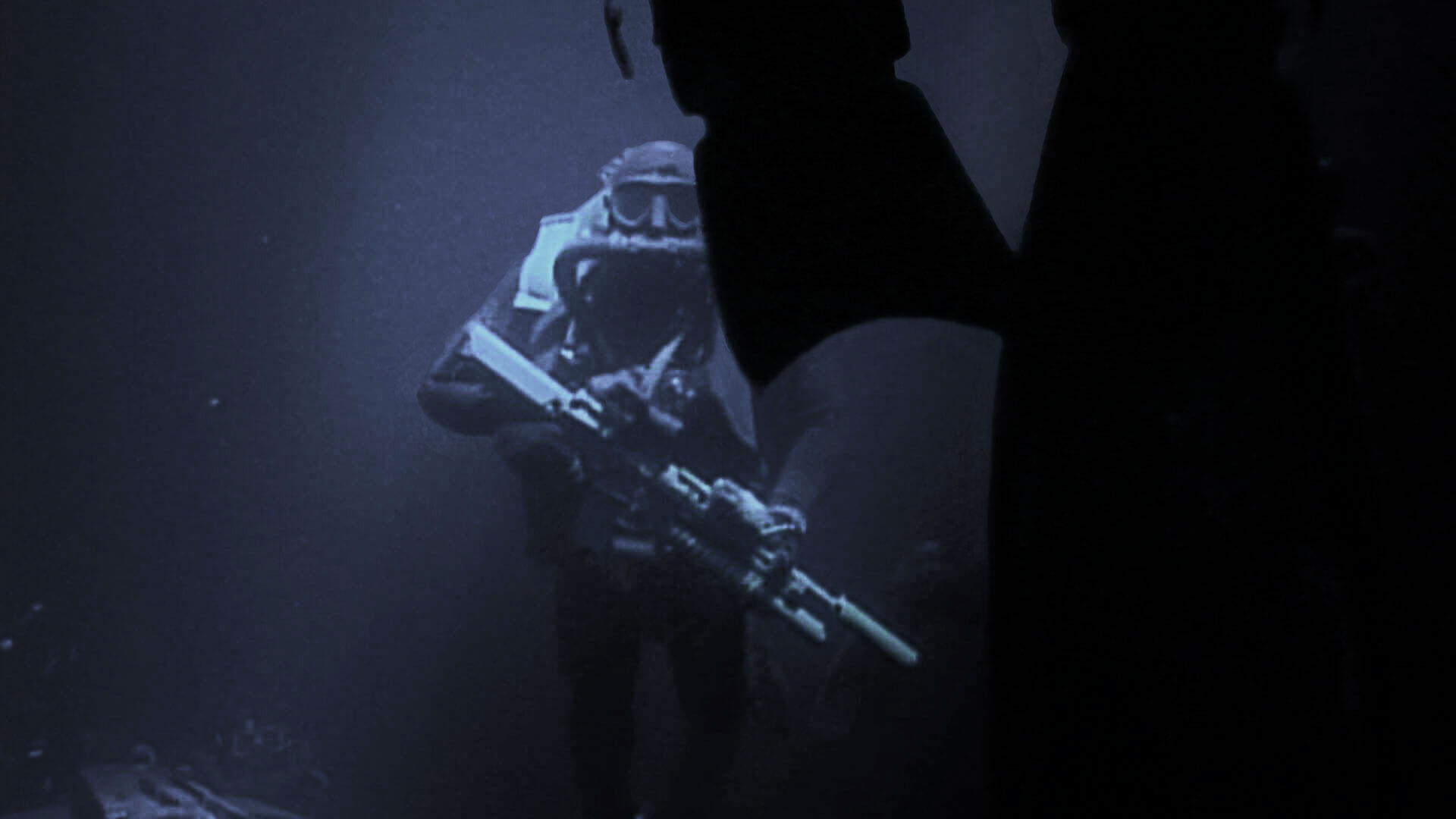 US Navy SEAL Operator under water during mission. [1920 x 1080] r