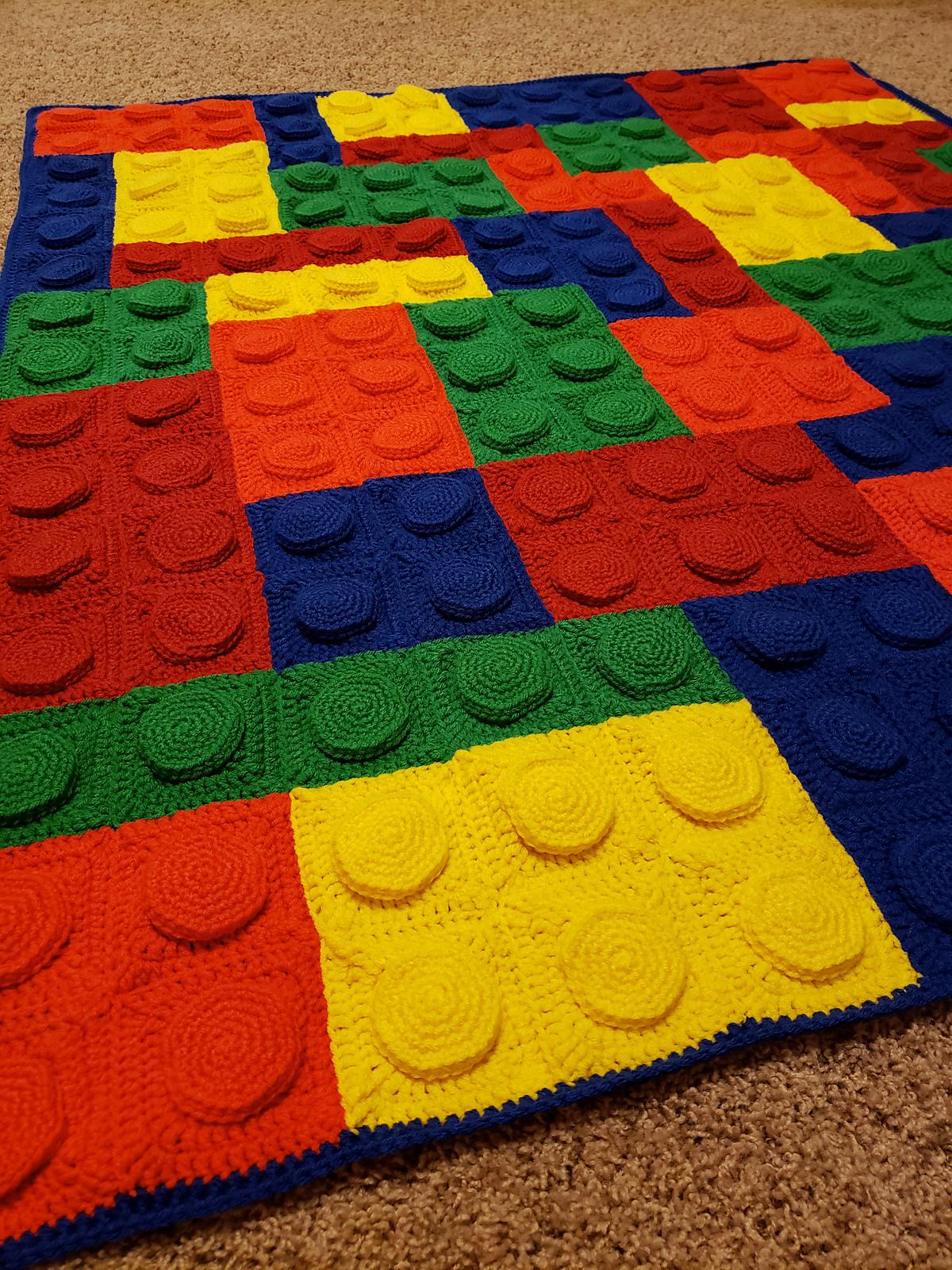 Since everyone is posting Lego blankets, here I the one I made for my