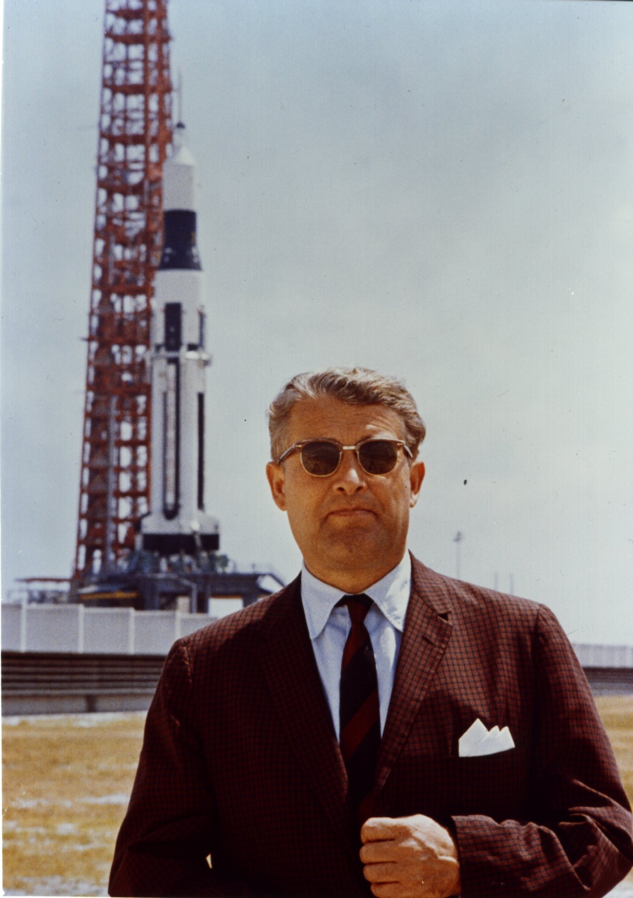 Dr. Werner von Braun poses at Complex 37B with a Saturn I May 1964 r