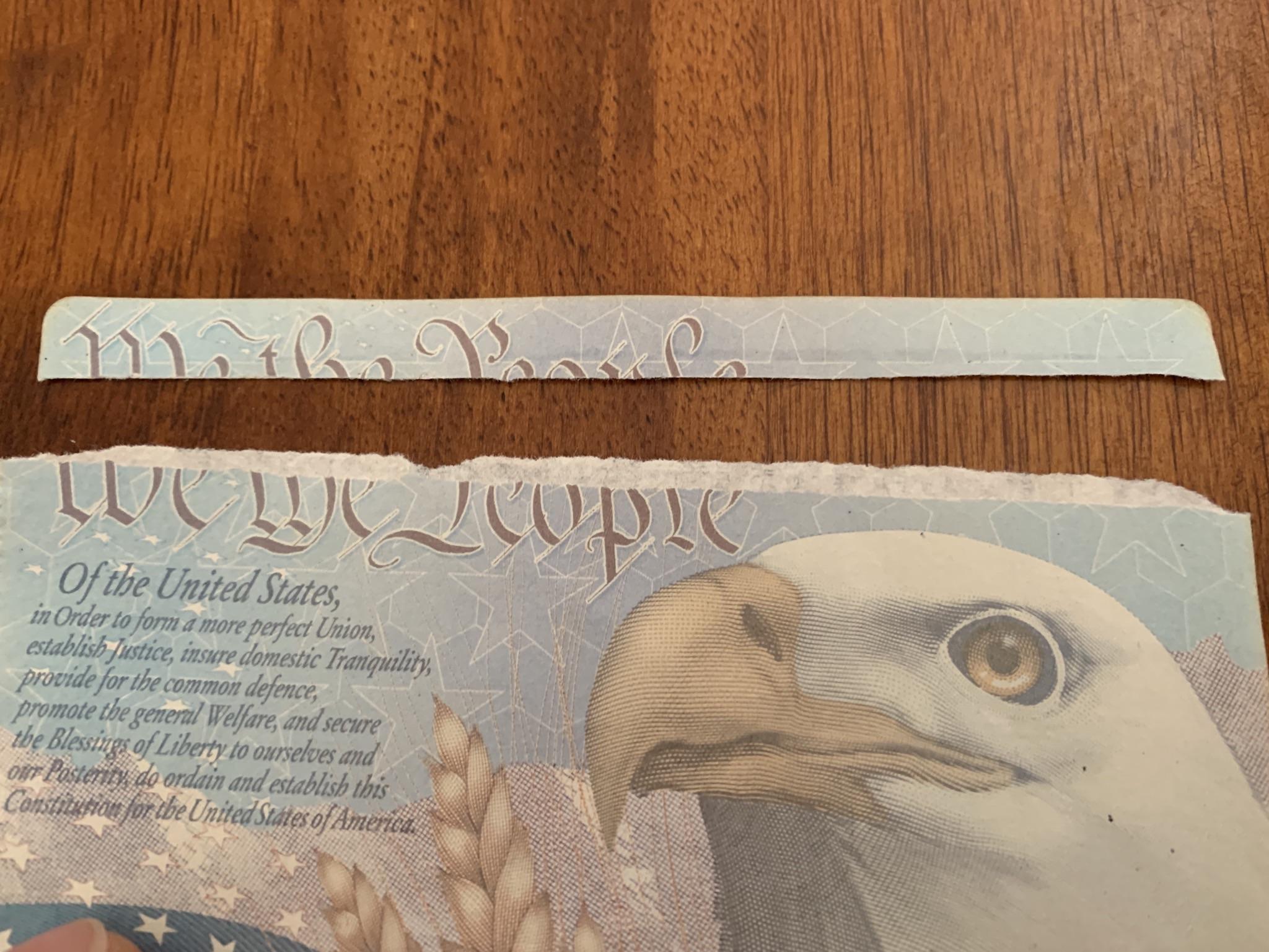 Ripped my passport one week from my trip. Do I need a replacement or is this ok? solotravel