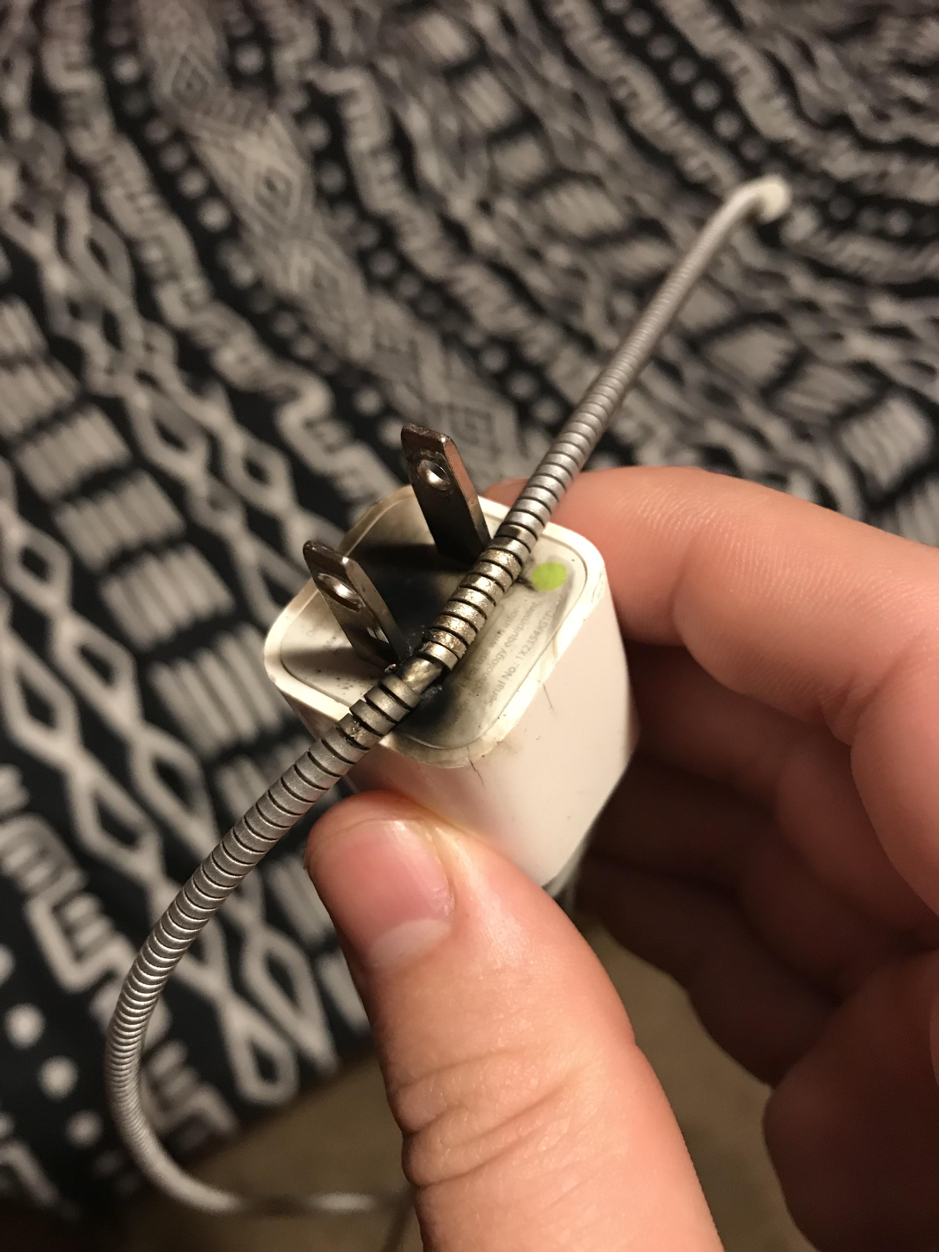 My metal charging cable fell onto my outlet and touched the metal