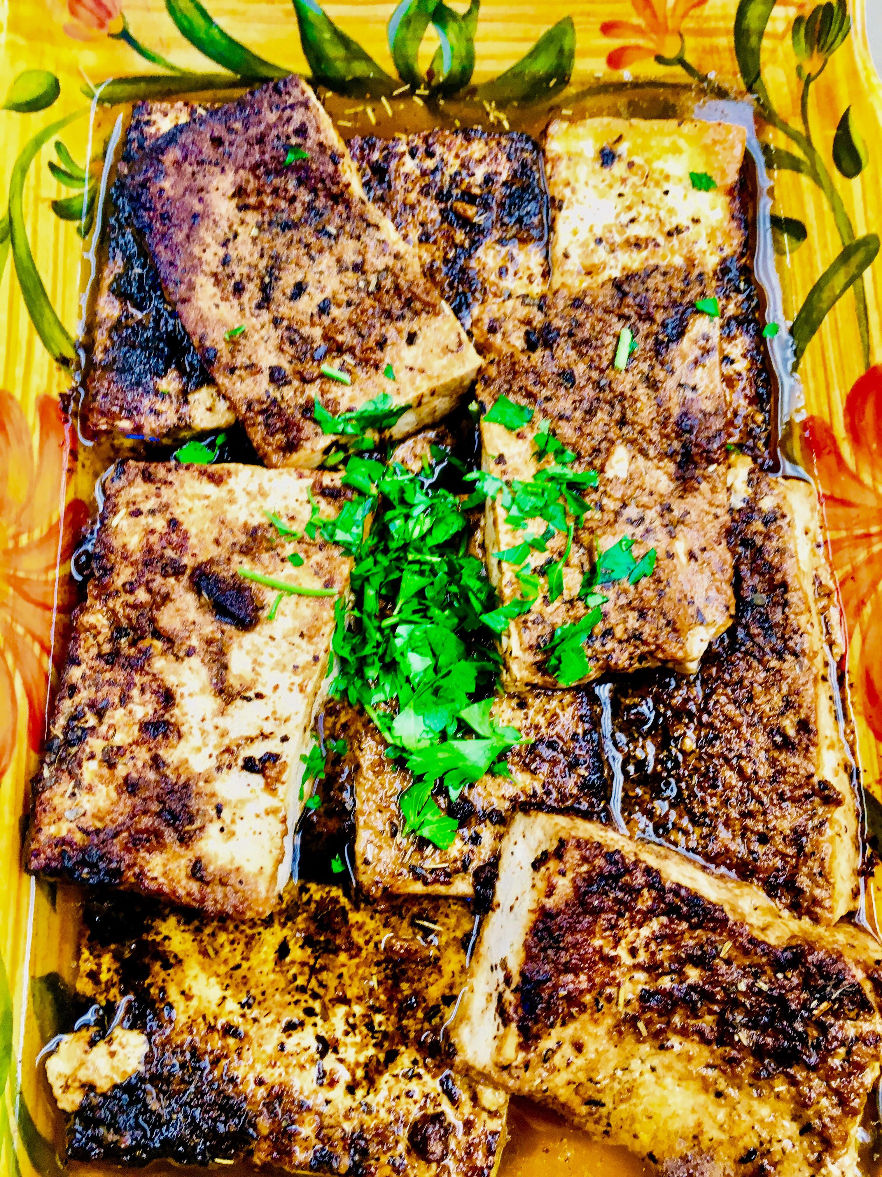 Thick cut slabs of extra firm tofu, marinated in olive oil, shoyu