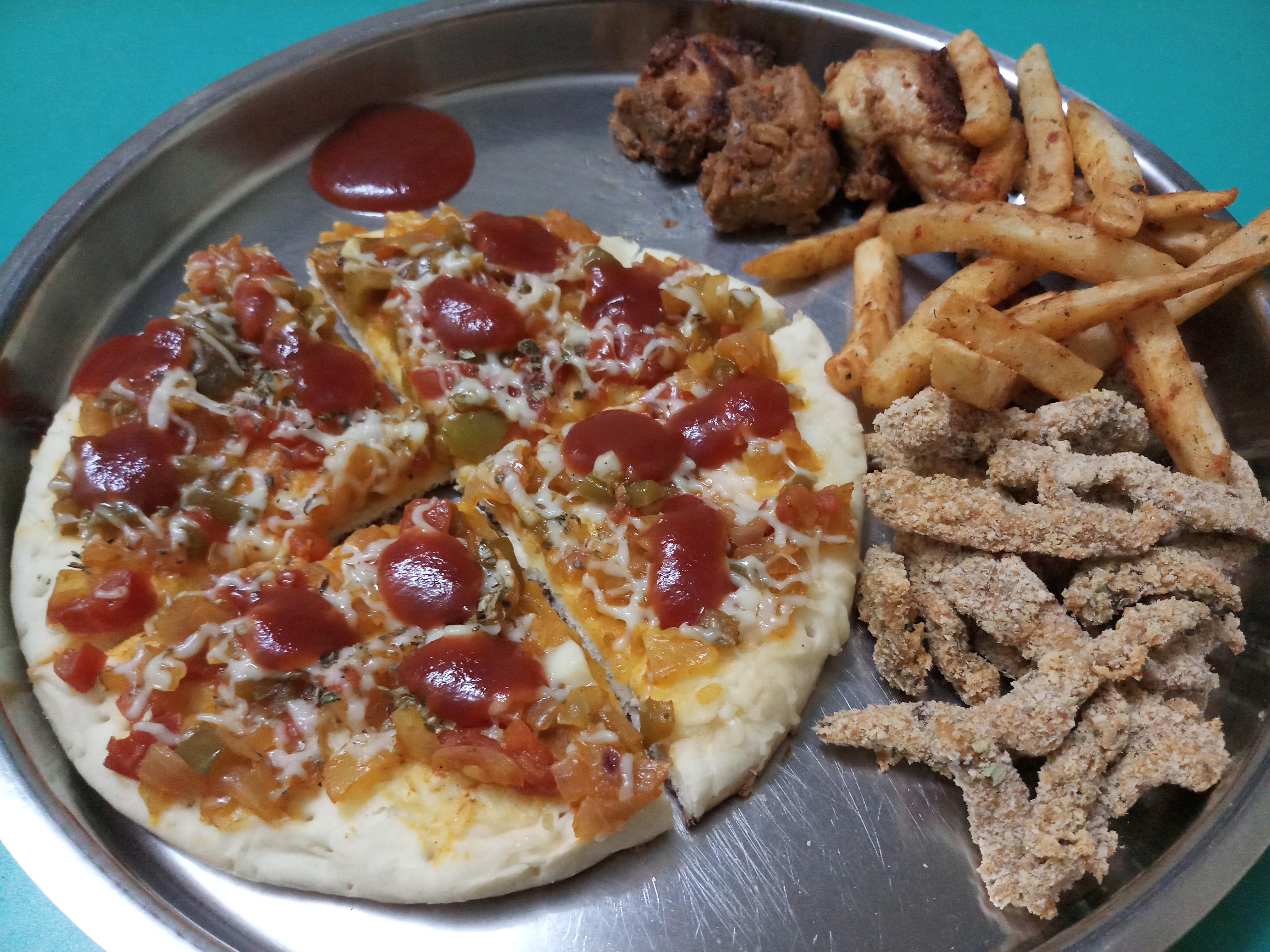 [Homemade] veg cheese pizza with French fries and chicken fingers r/food