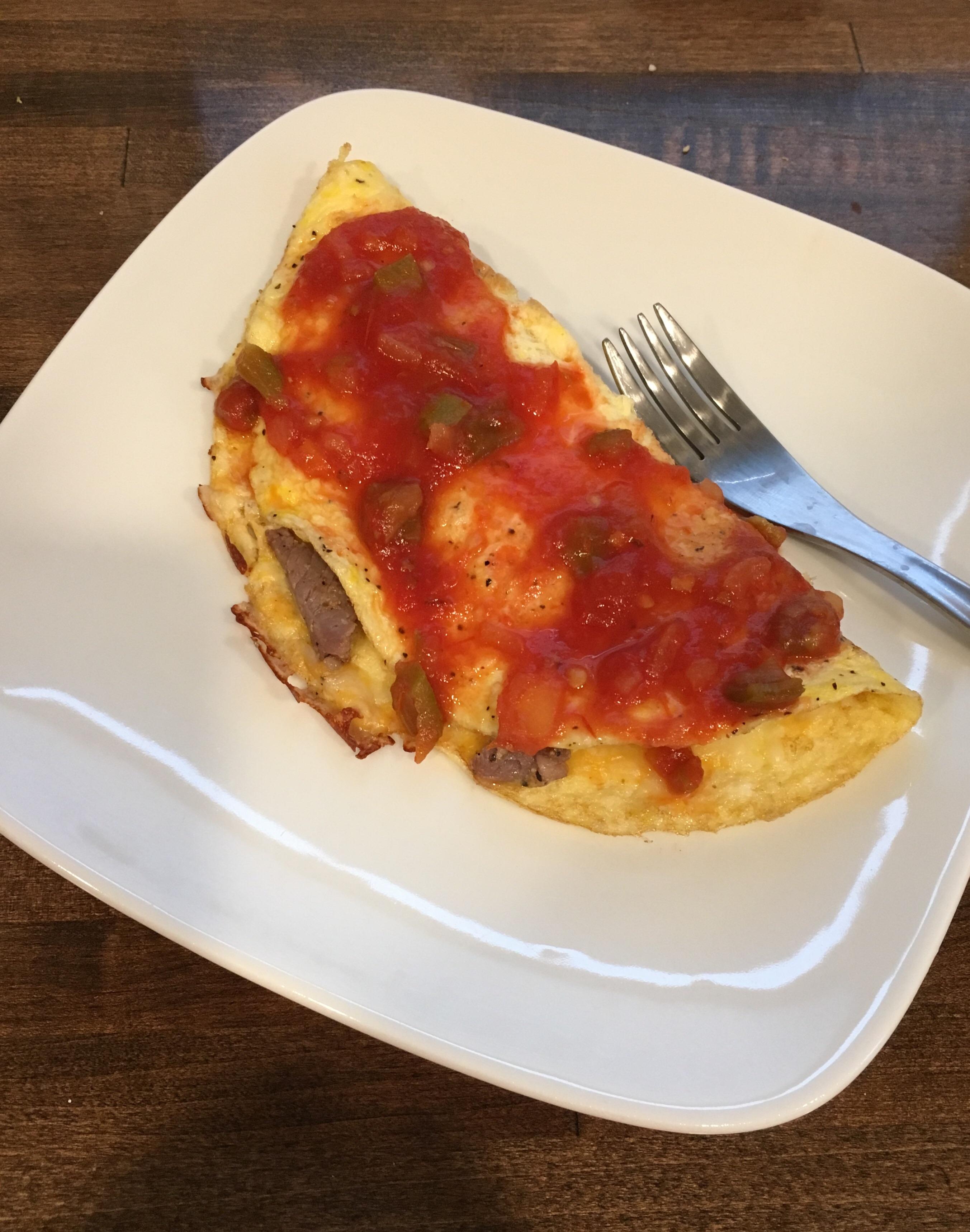 Made good use of my leftover ribeye! A 257 calorie steak omelet. r