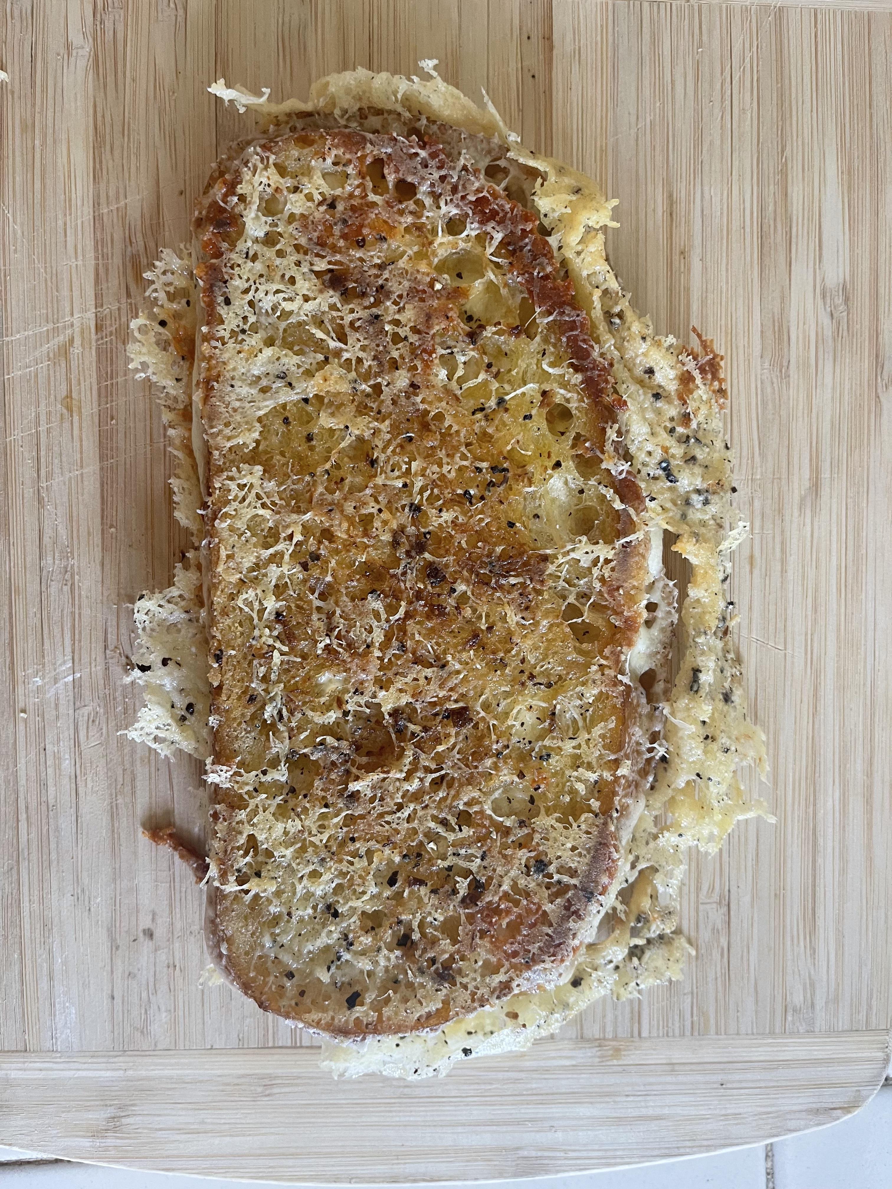 Pepper jack, manchego, havarti, and a peppercorn parmesan crust on a