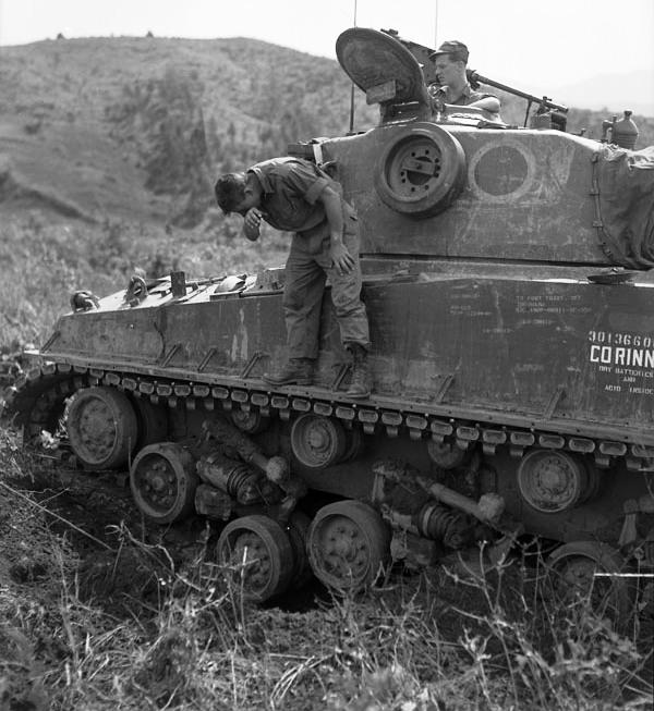 Canadian Sherman M4A3(76)W HVSS tank in a mine crater with damaged