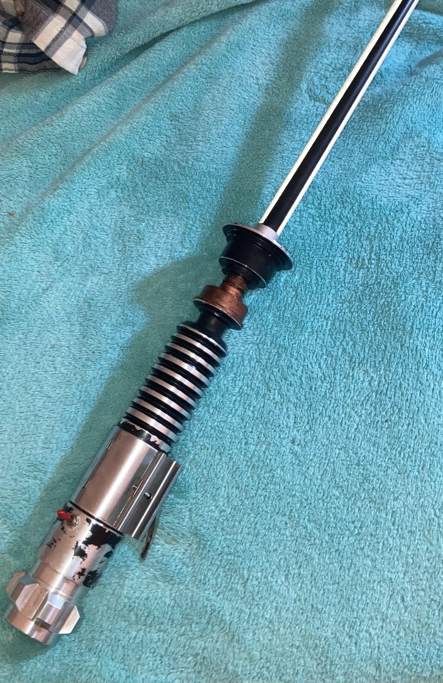 Closer look at the original ObiWan 1976 spinning lightsaber props my