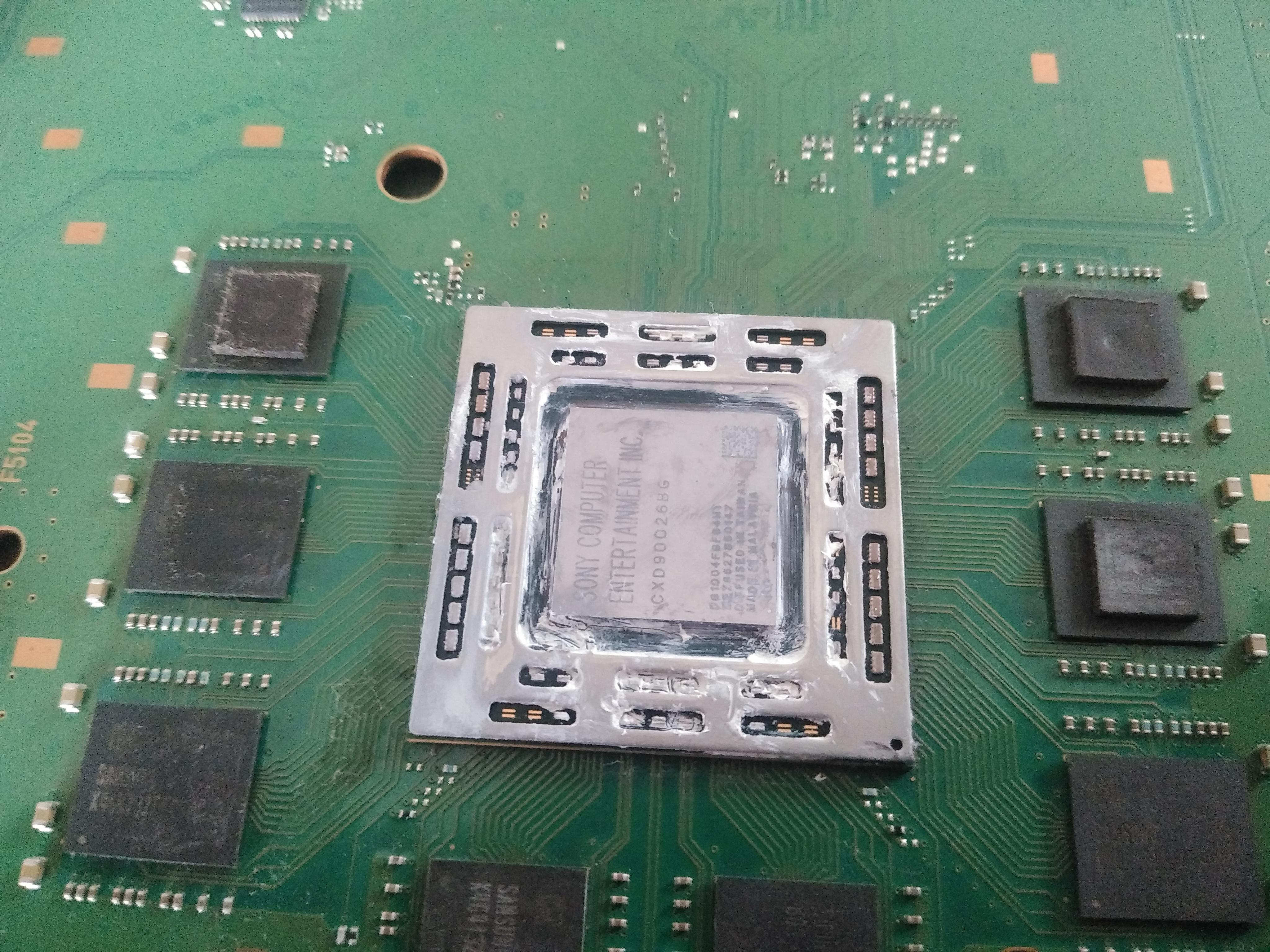 Attempted to remove thermal paste from PS4 cpu (There's paste outside