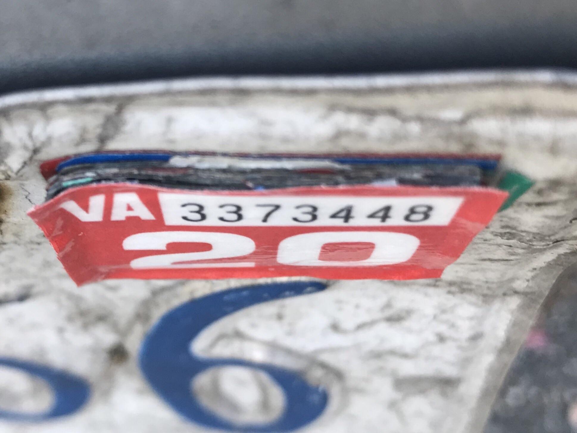 18 years of registration stickers. I saw no reason to peel the old ones