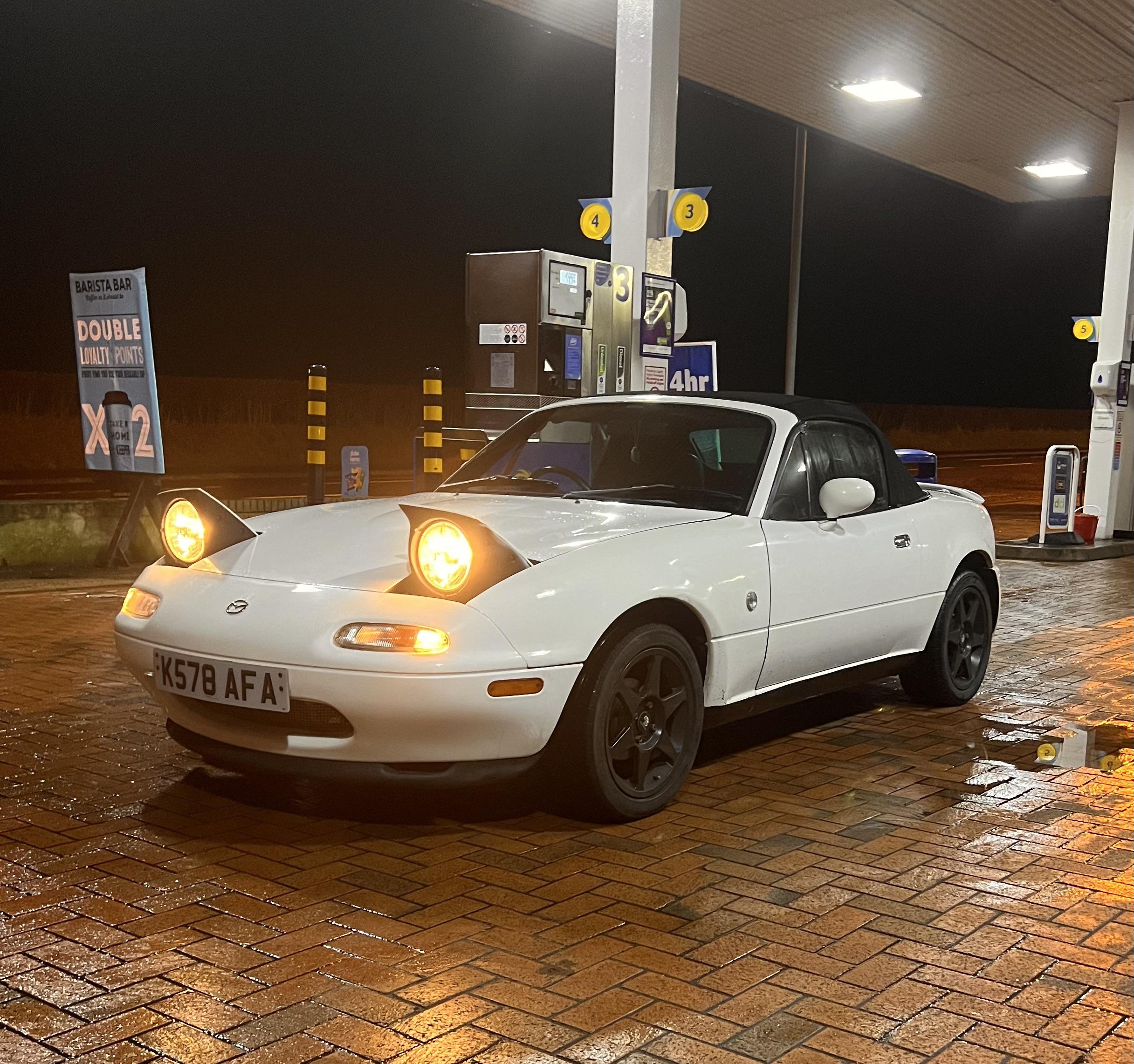 Does anyone have an NA with NB shocks that has lowering springs? r/Miata