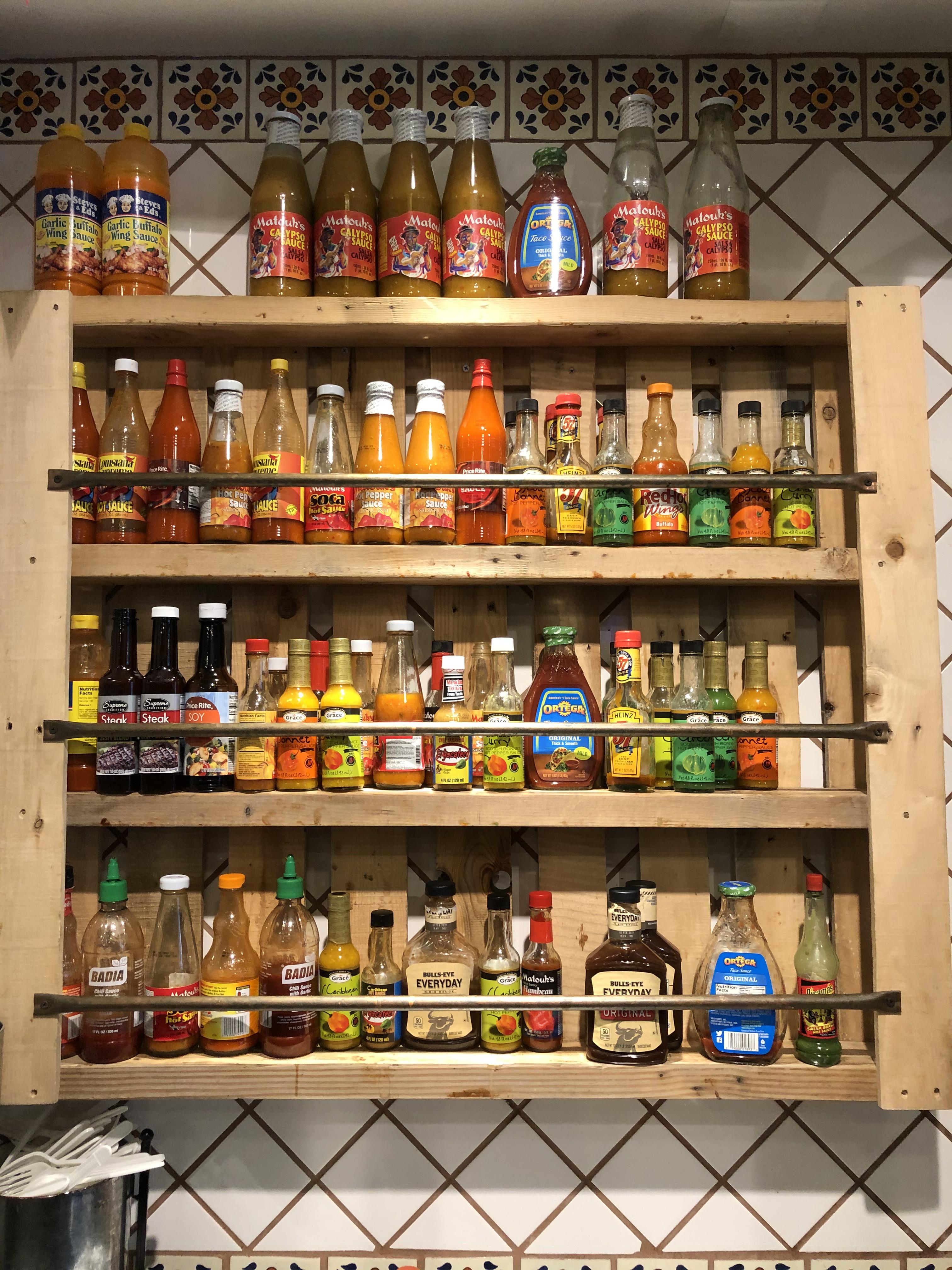 Hot sauce rack at local burrito shop r/hotsauce