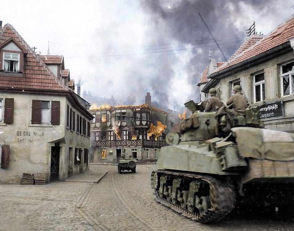 An M4A3 Sherman of the 11th Armored Division, 3rd US Army makes its way to the center of the