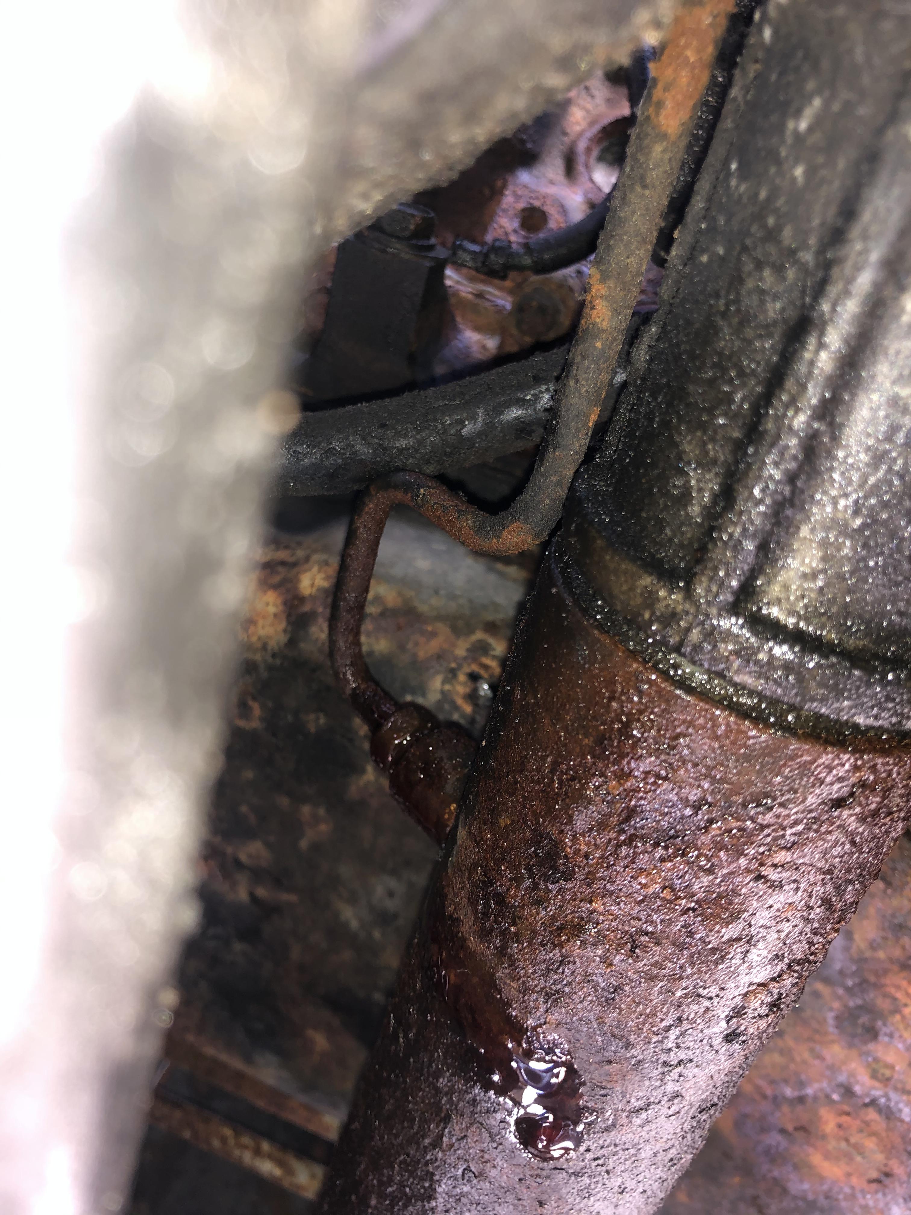 What should I do about the power steering fluid leaking from this line