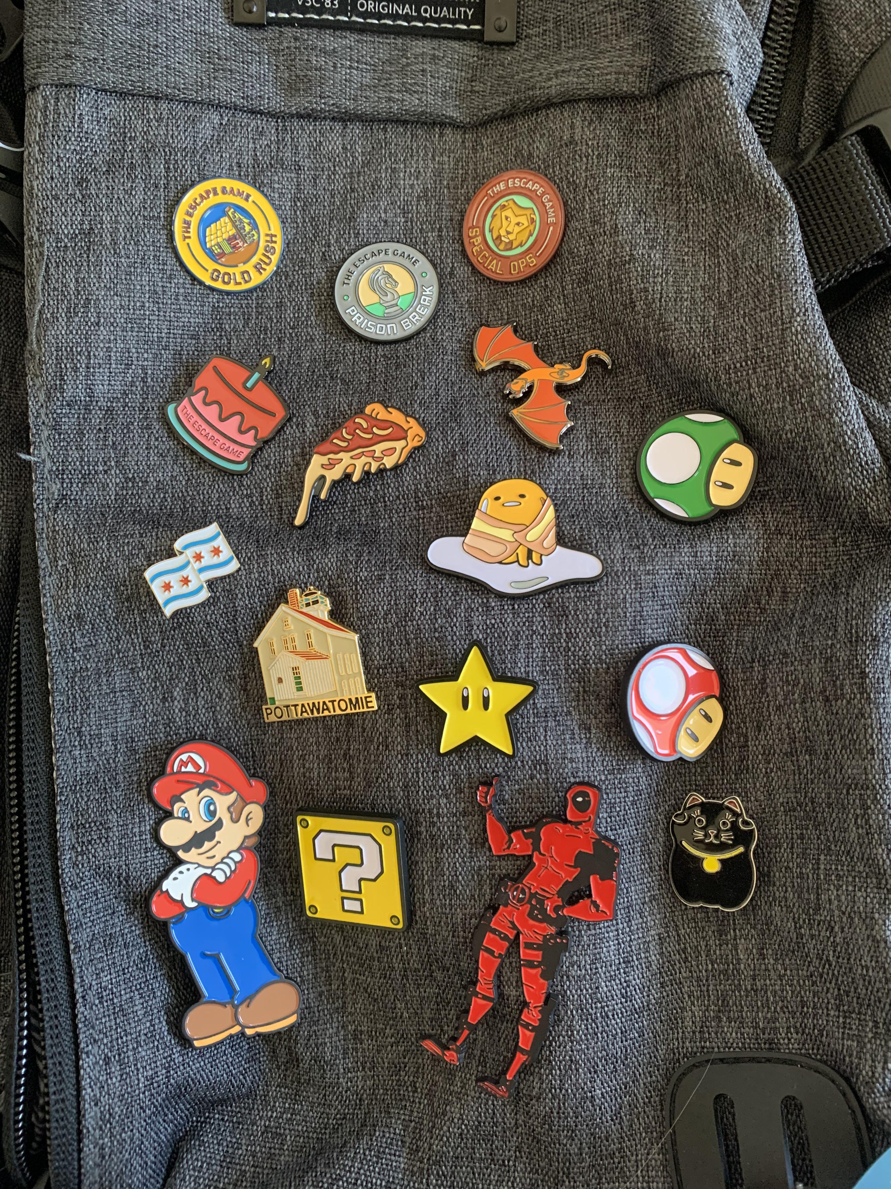 My growing enamel pin collection for my backpack r/CoolCollections