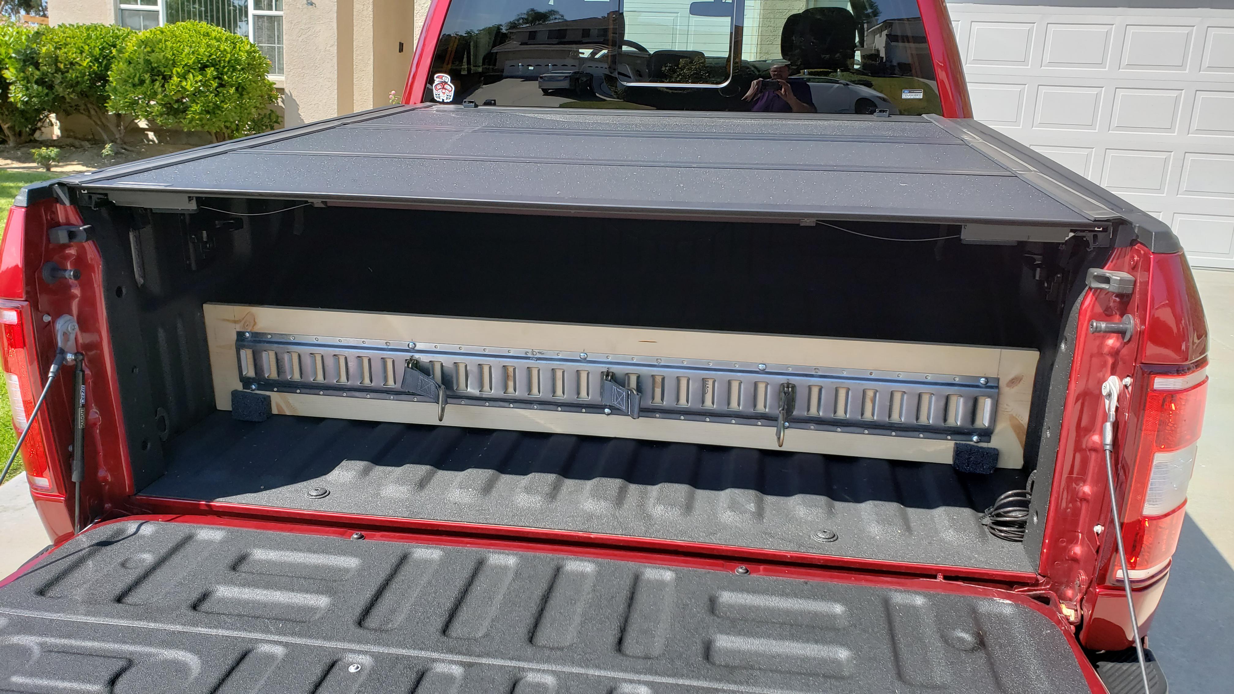 Dirt cheap and really useful bed divider made from 1"x10" pine board