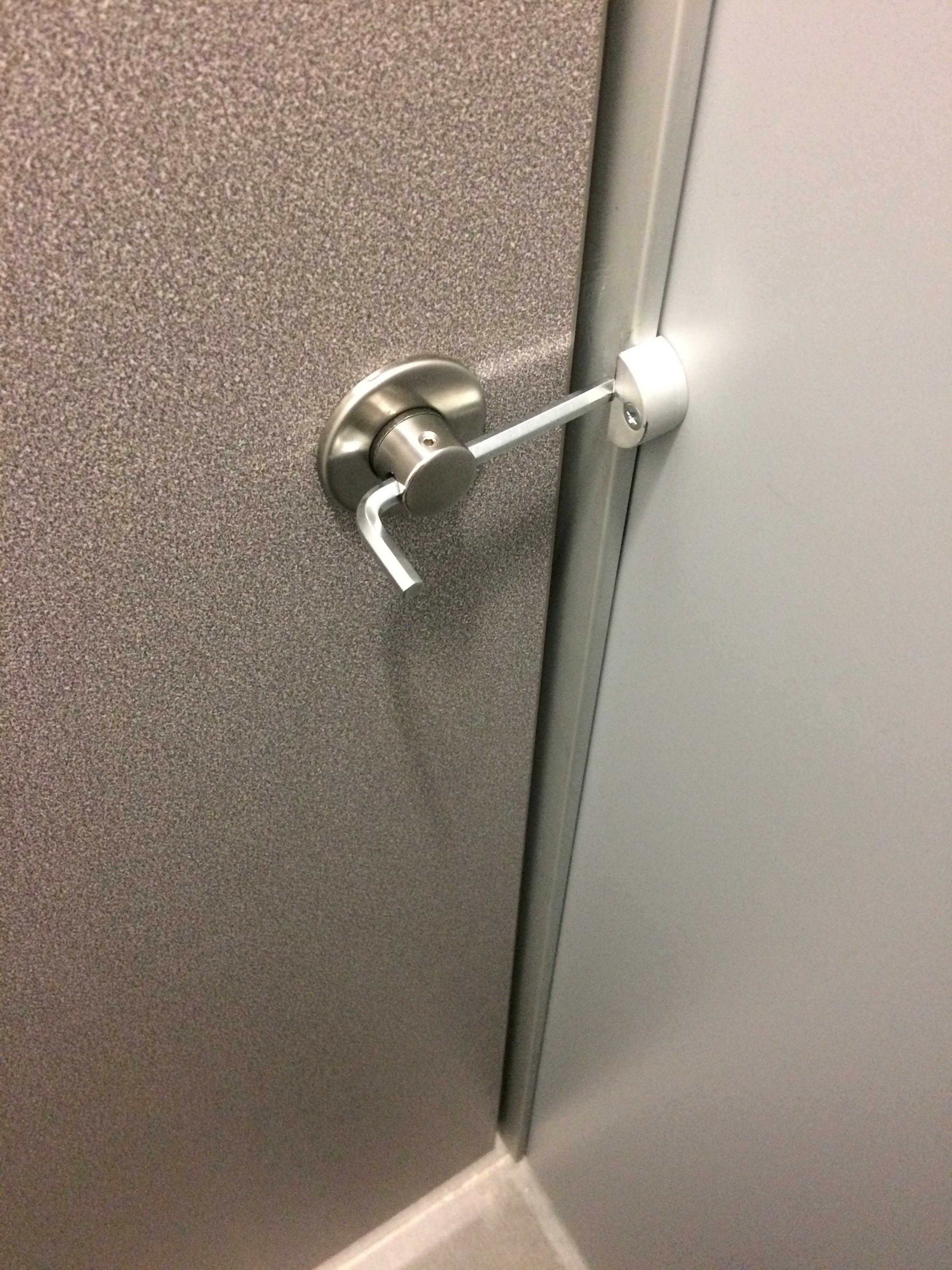 An Allen key being used as a toilet door lock in my university r