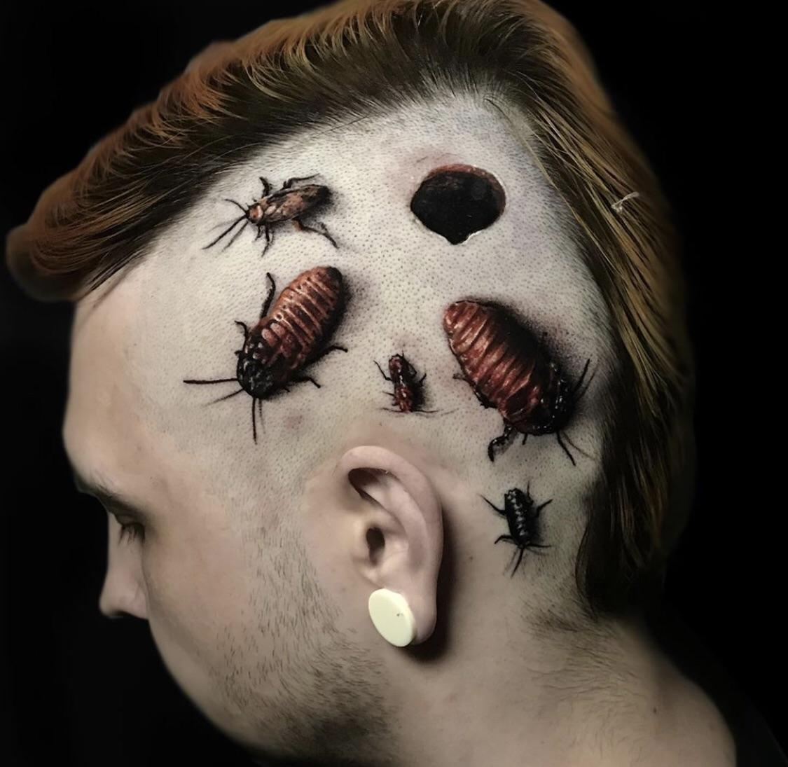 beautifully done... cockroach.. head tattoo. ATBGE