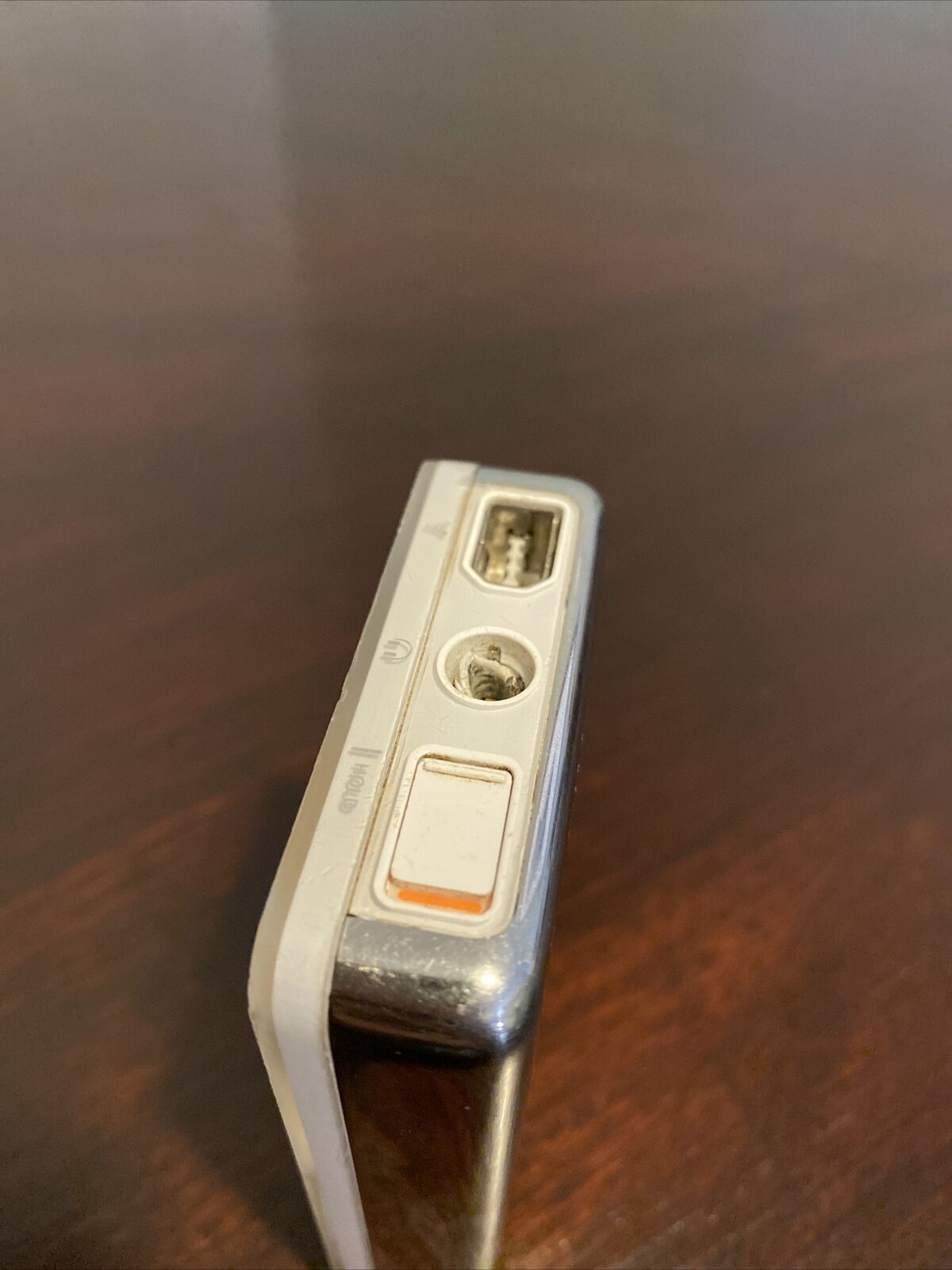 How do people let their iPods get like this? Cracked headphone jacks