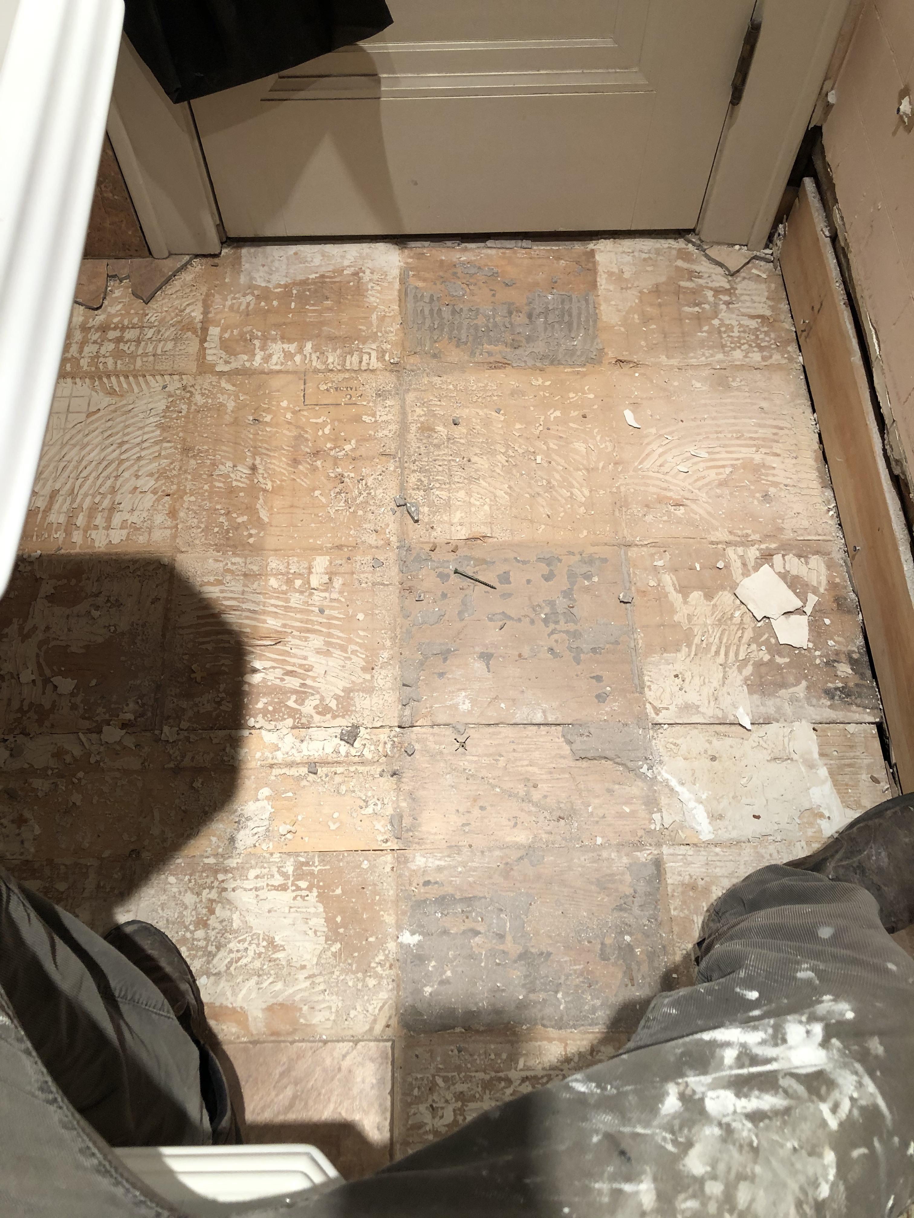 Bathroom remodel. Subfloor question plywood has lots of mortar on it