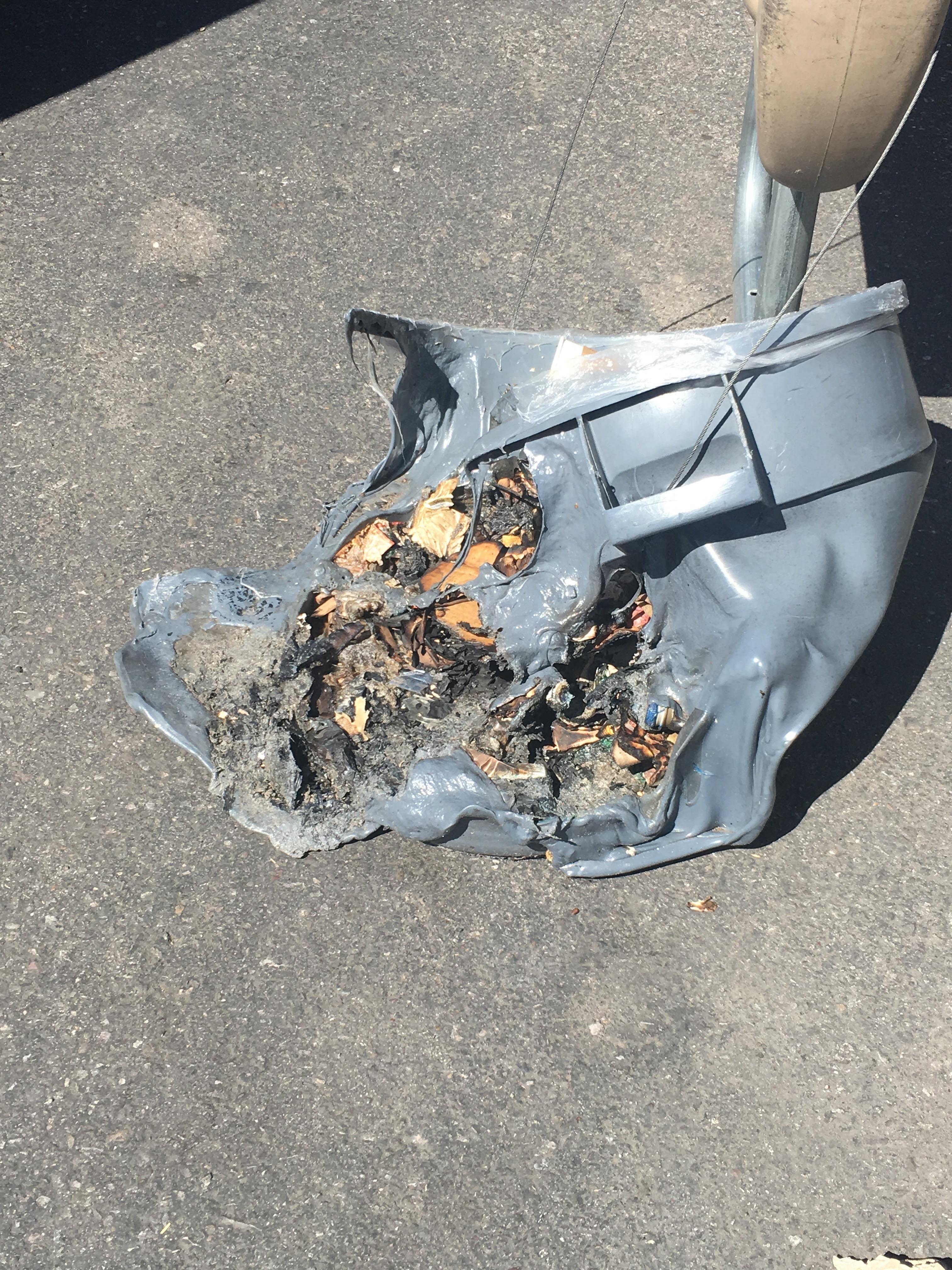 Trash cans melted outside of the Safeway in Tucson, AZ r