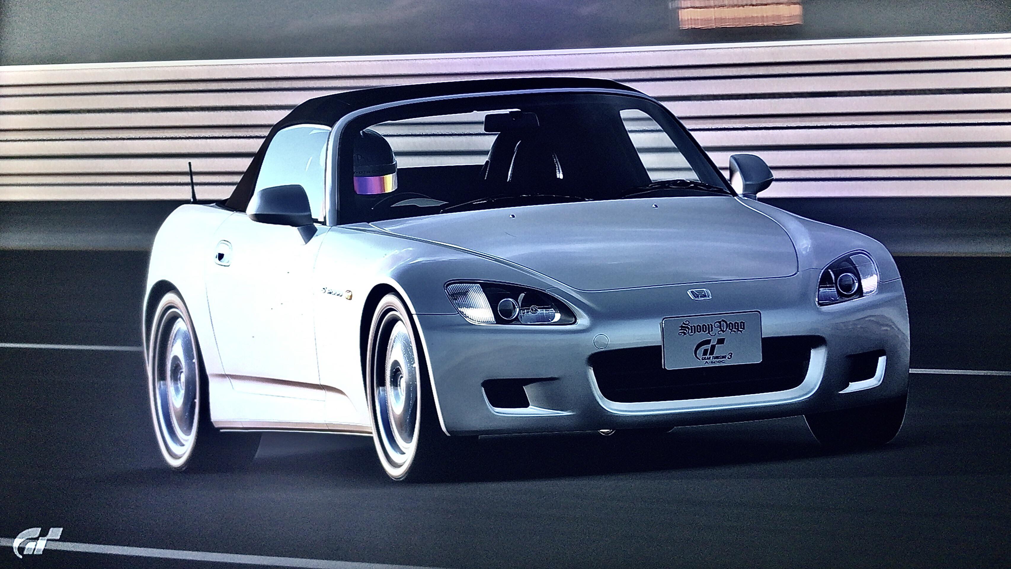 A silver and black Honda S2000 on chrome wheels going 298 km/h. : r
